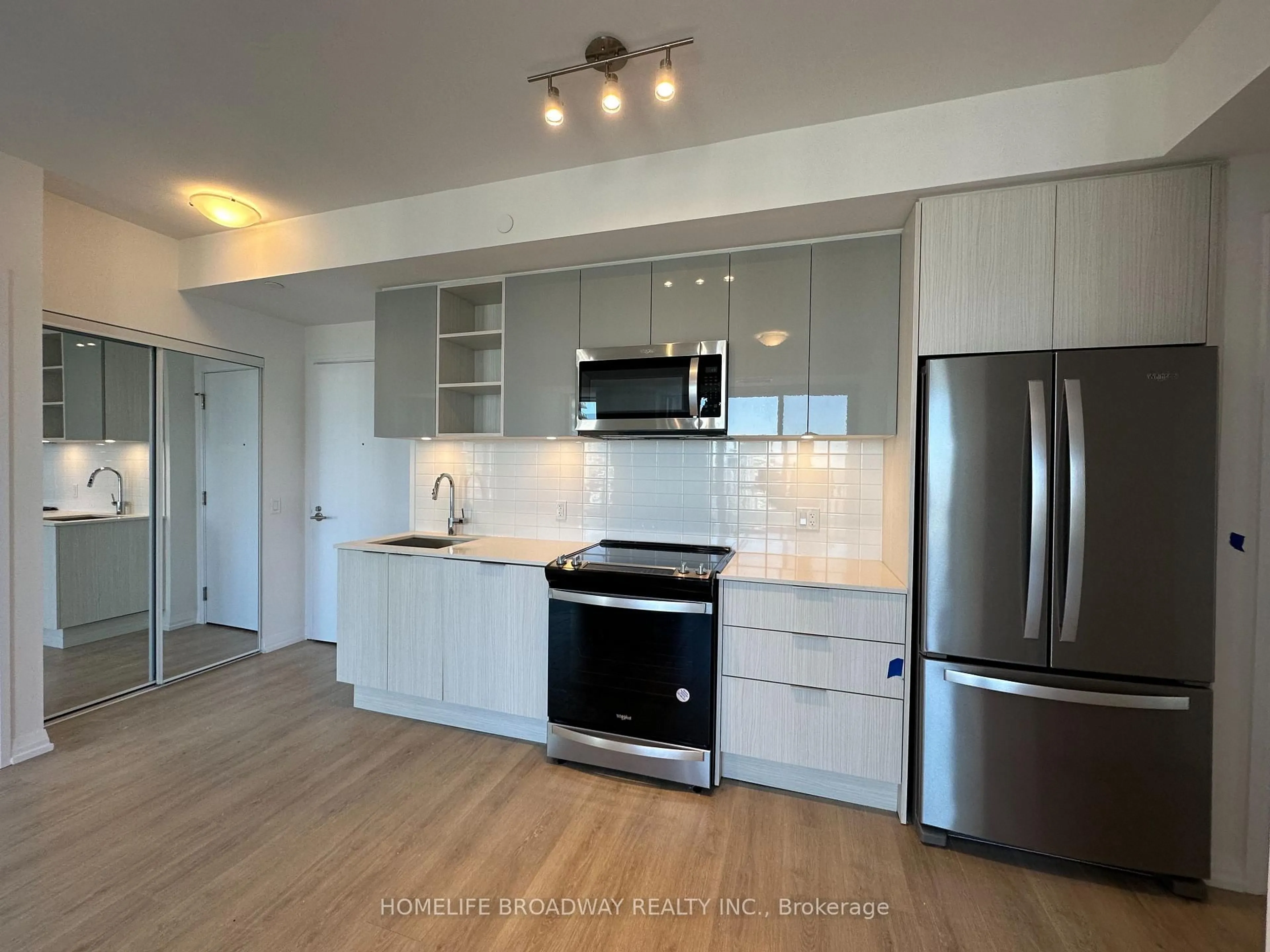 Open concept kitchen, wood/laminate floor for 50 Dunfield Ave #3018, Toronto Ontario M4S 0E4
