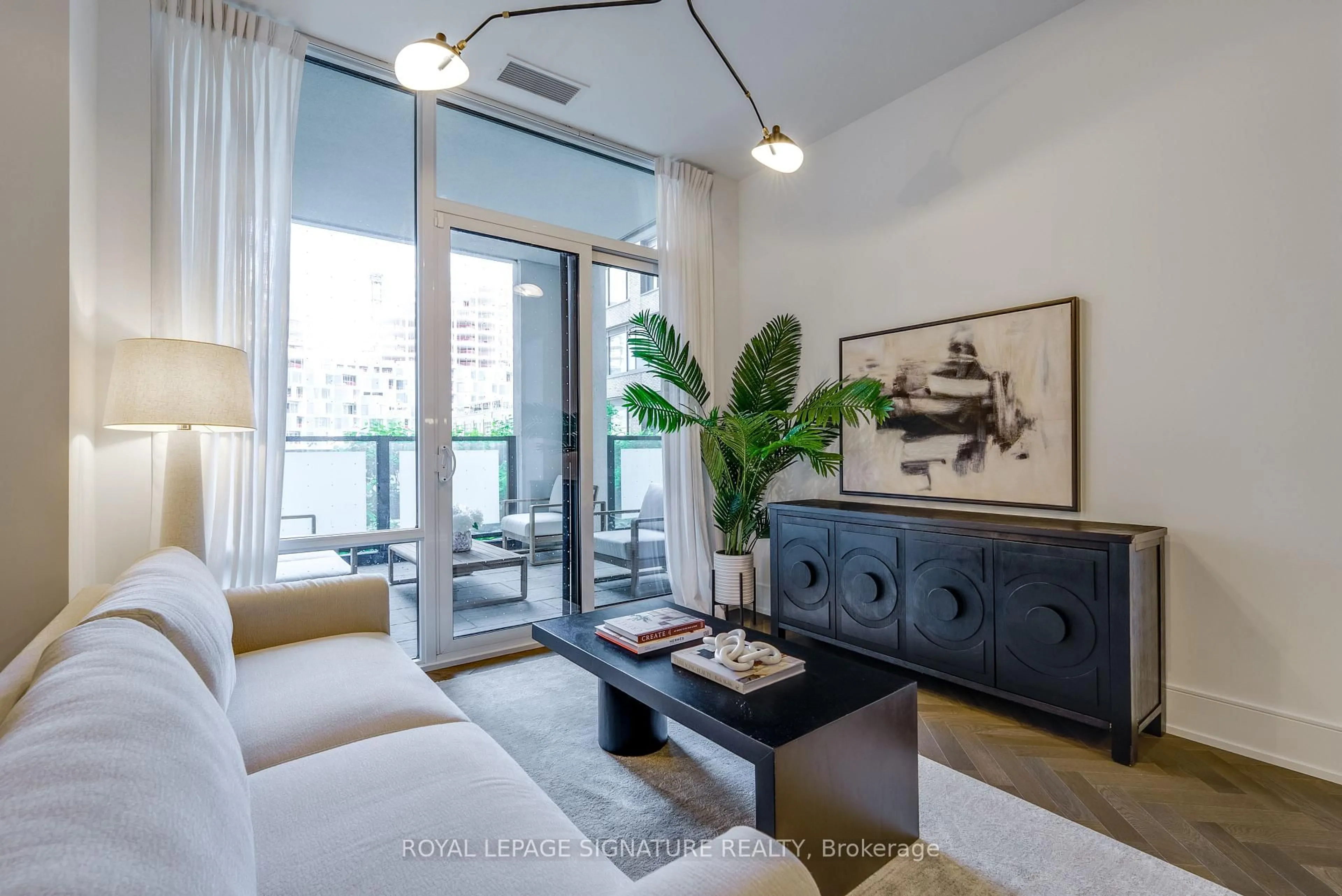 Living room with furniture, unknown for 455 Wellington St #312, Toronto Ontario M5V 0V8