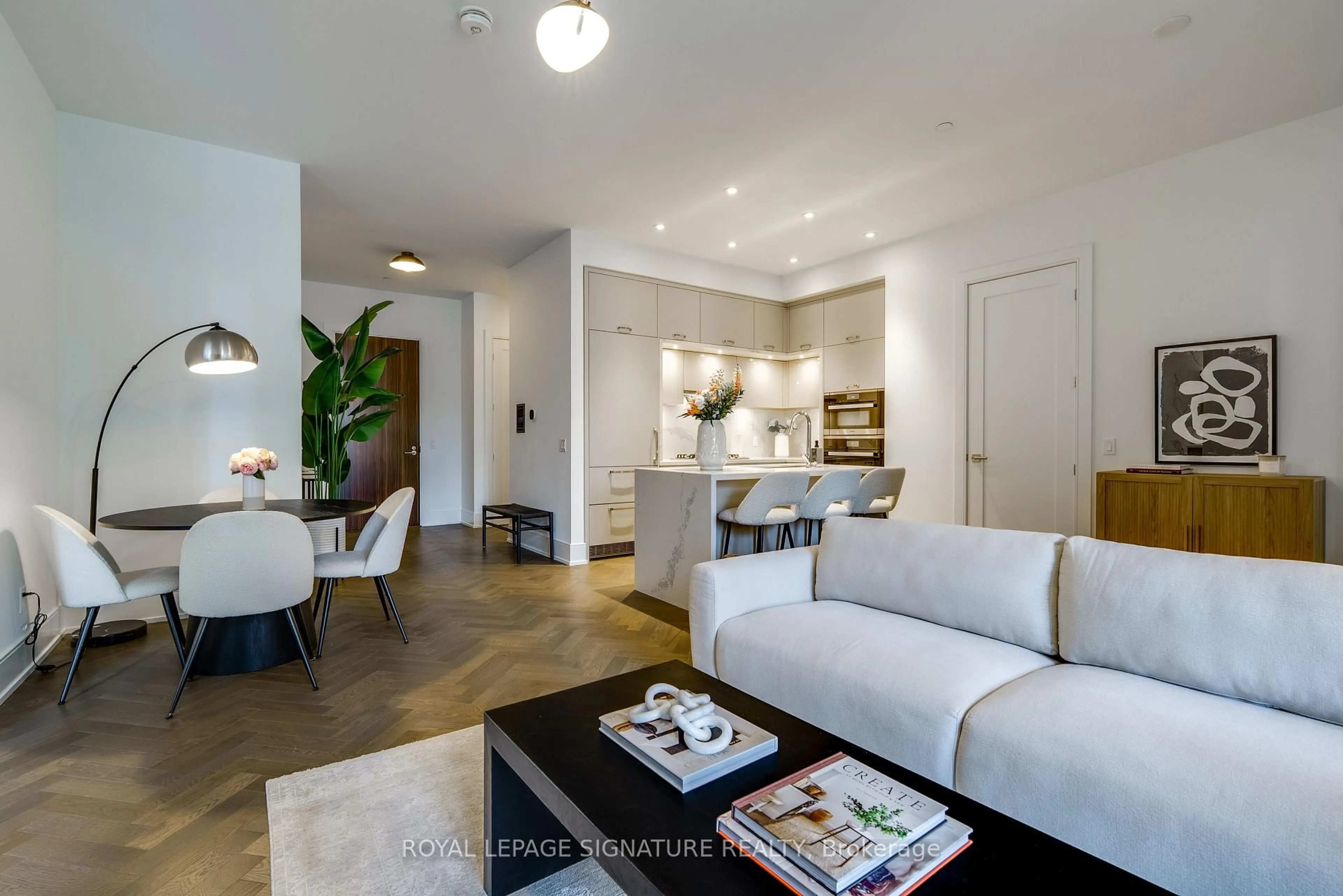 Living room with furniture, wood/laminate floor for 455 Wellington St #312, Toronto Ontario M5V 0V8