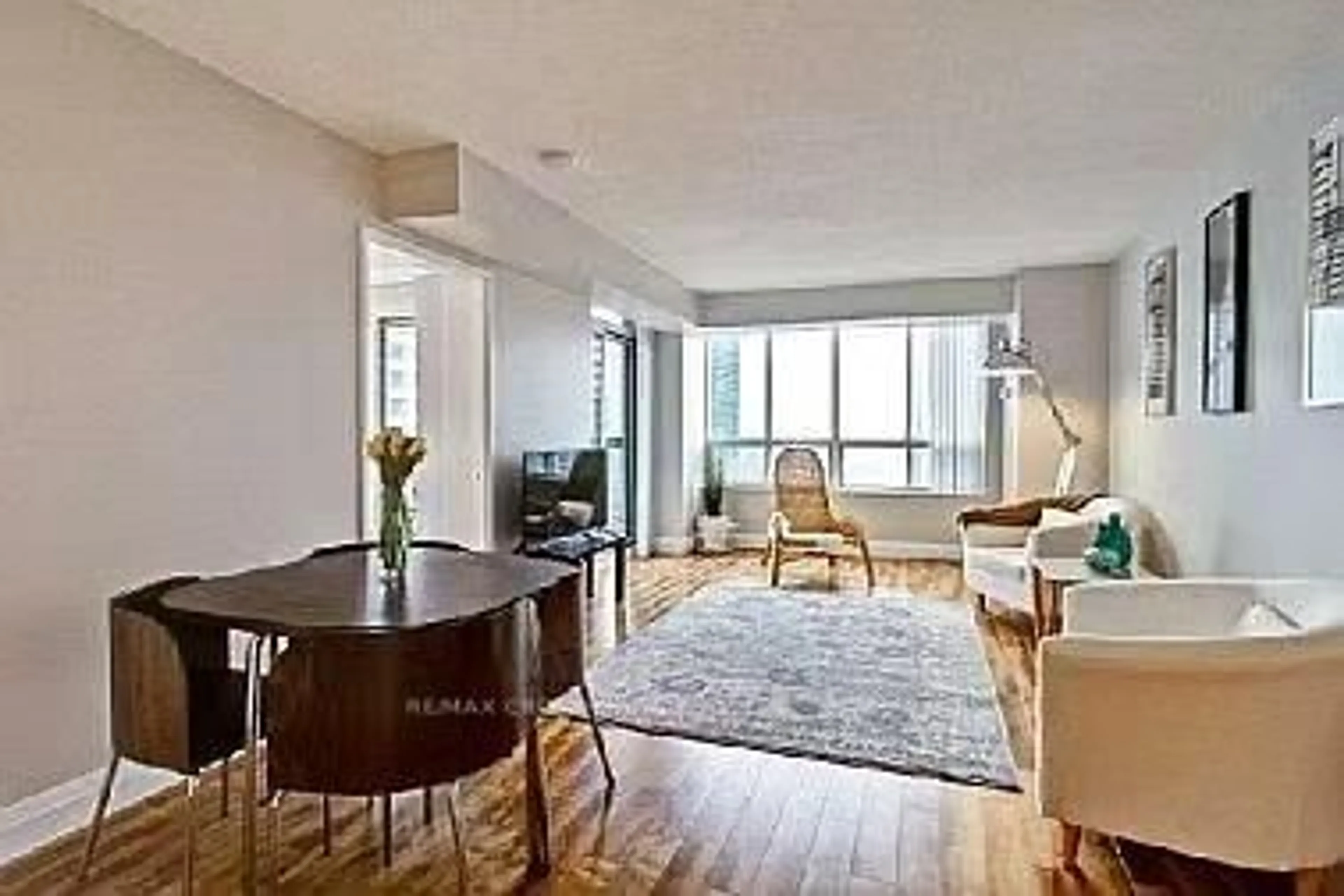 Living room with furniture, wood/laminate floor for 28 Empress Ave #2012, Toronto Ontario M2N 6Z7