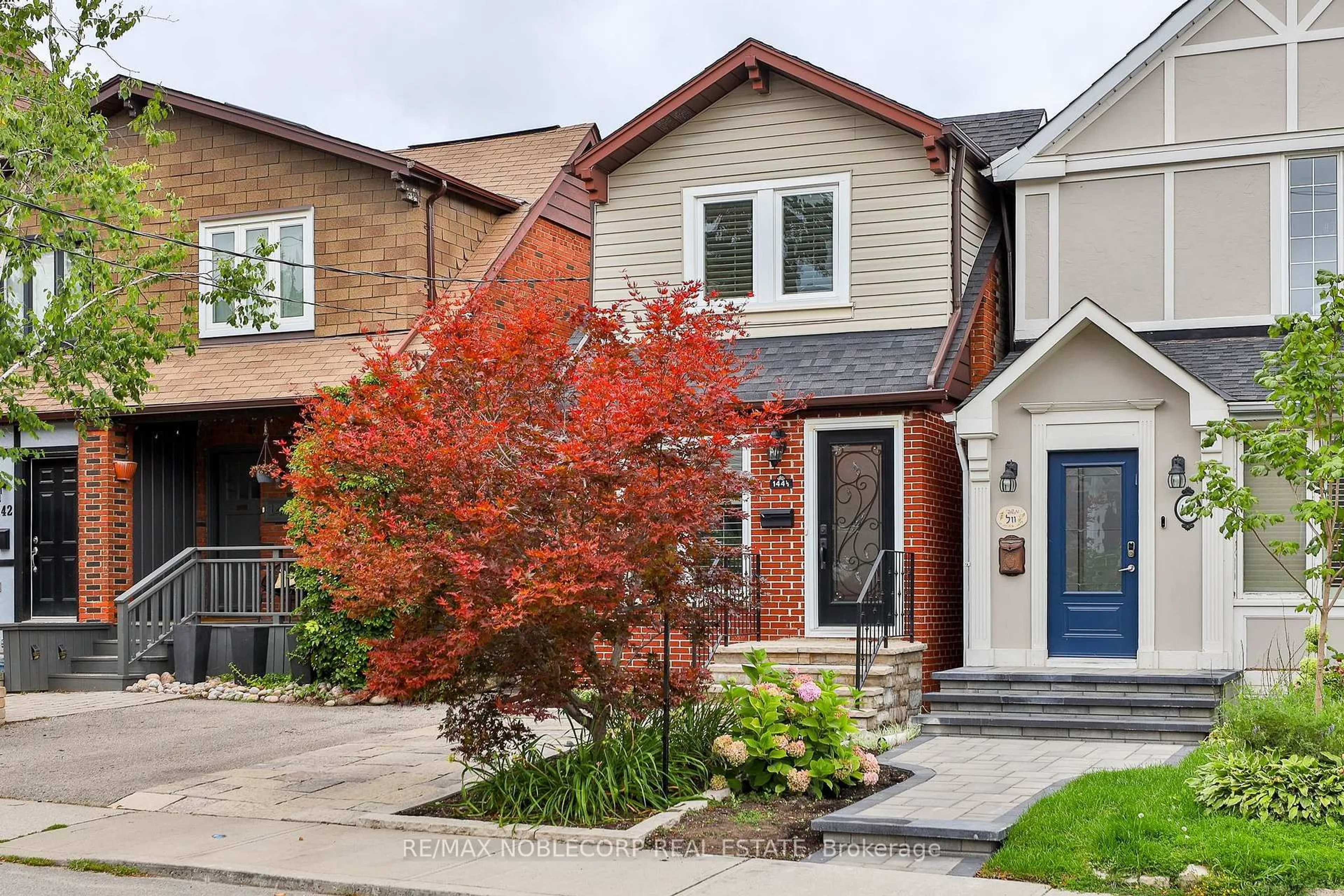 Home with brick exterior material, street for 144B Roslin Ave, Toronto Ontario M4N 1Z4