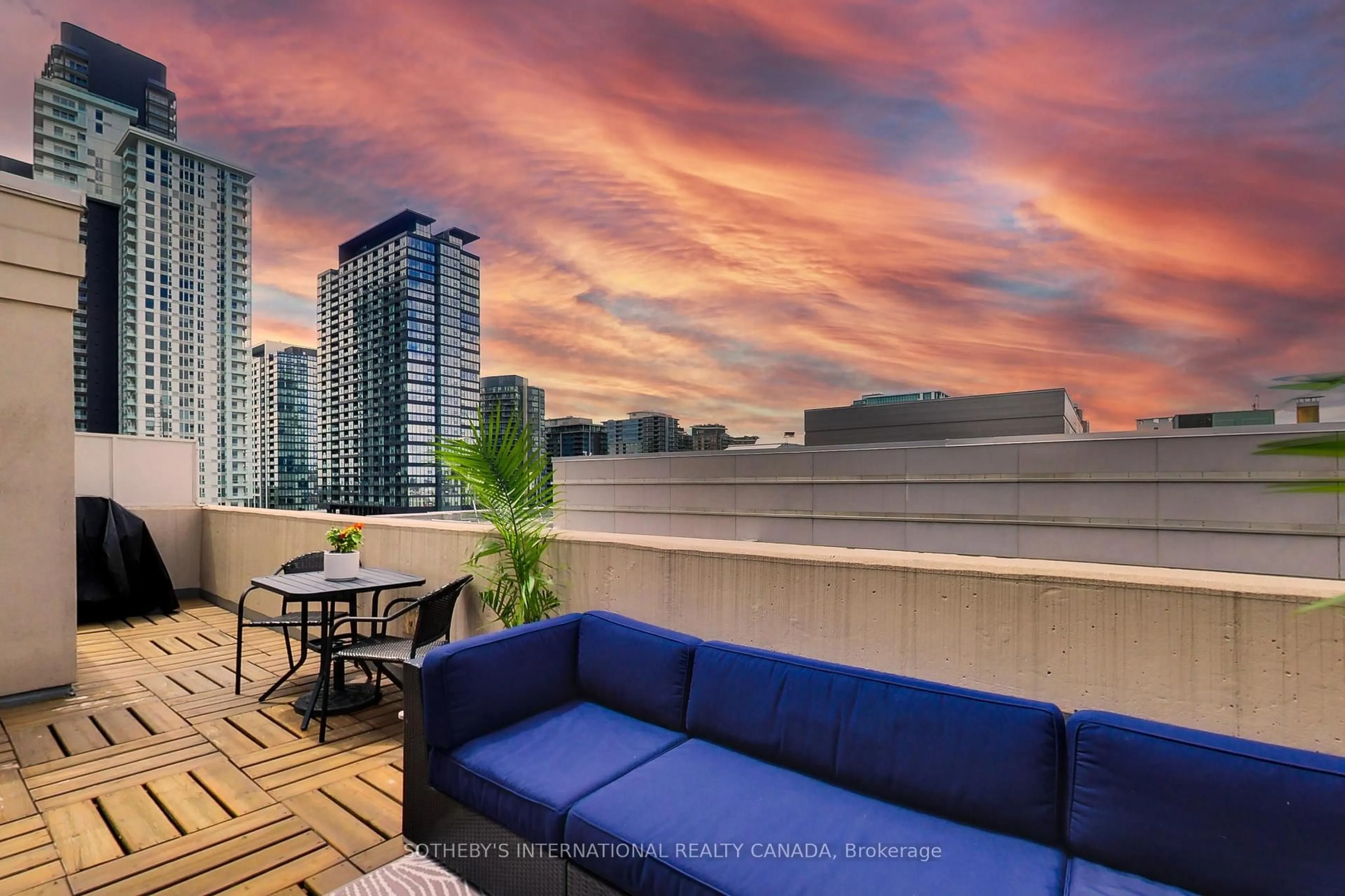 Patio, city buildings view from balcony for 18 Stafford St #PH10, Toronto Ontario M5V 3W4