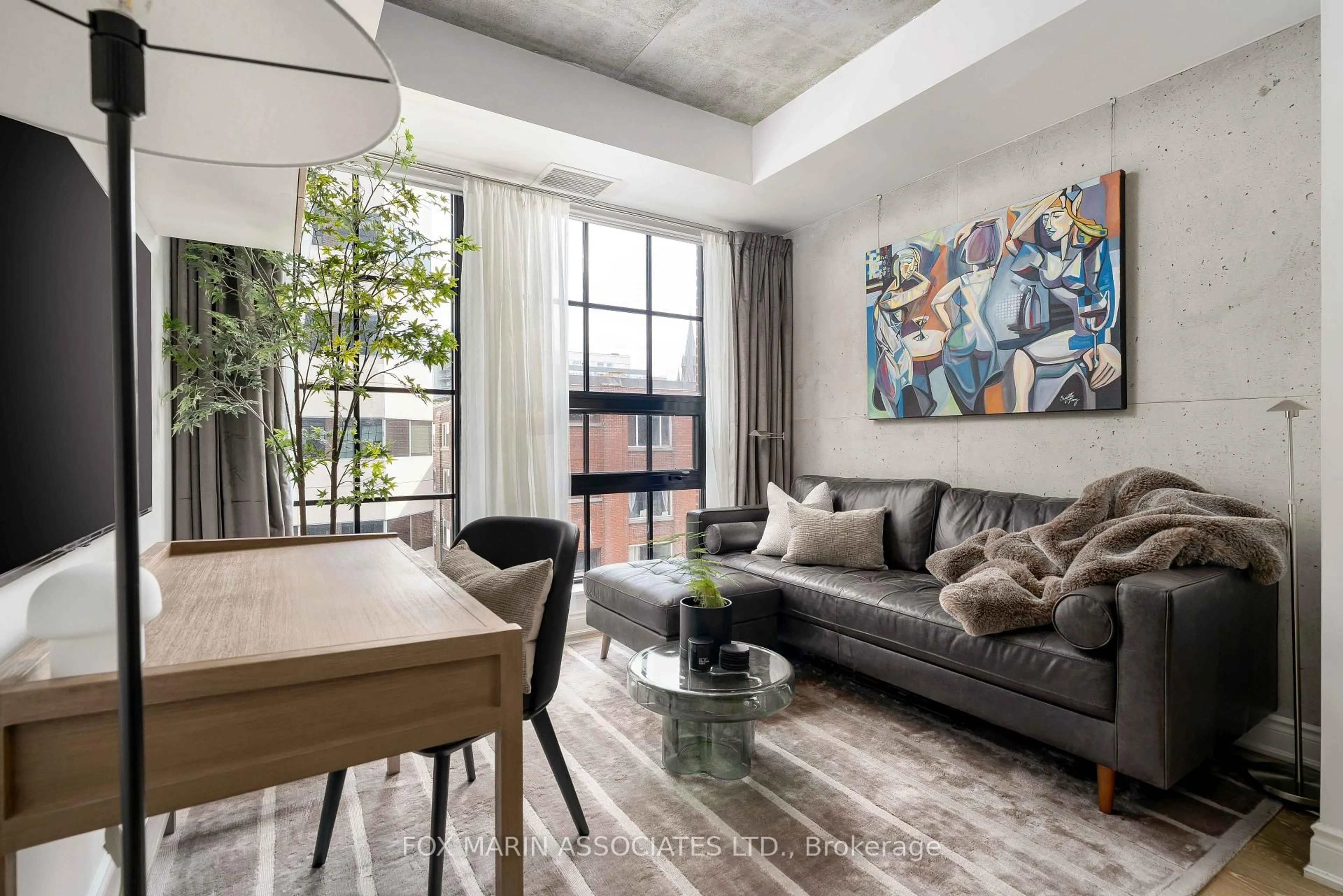 Living room with furniture, cement floor for 608 Richmond St #404, Toronto Ontario M5V 0N9
