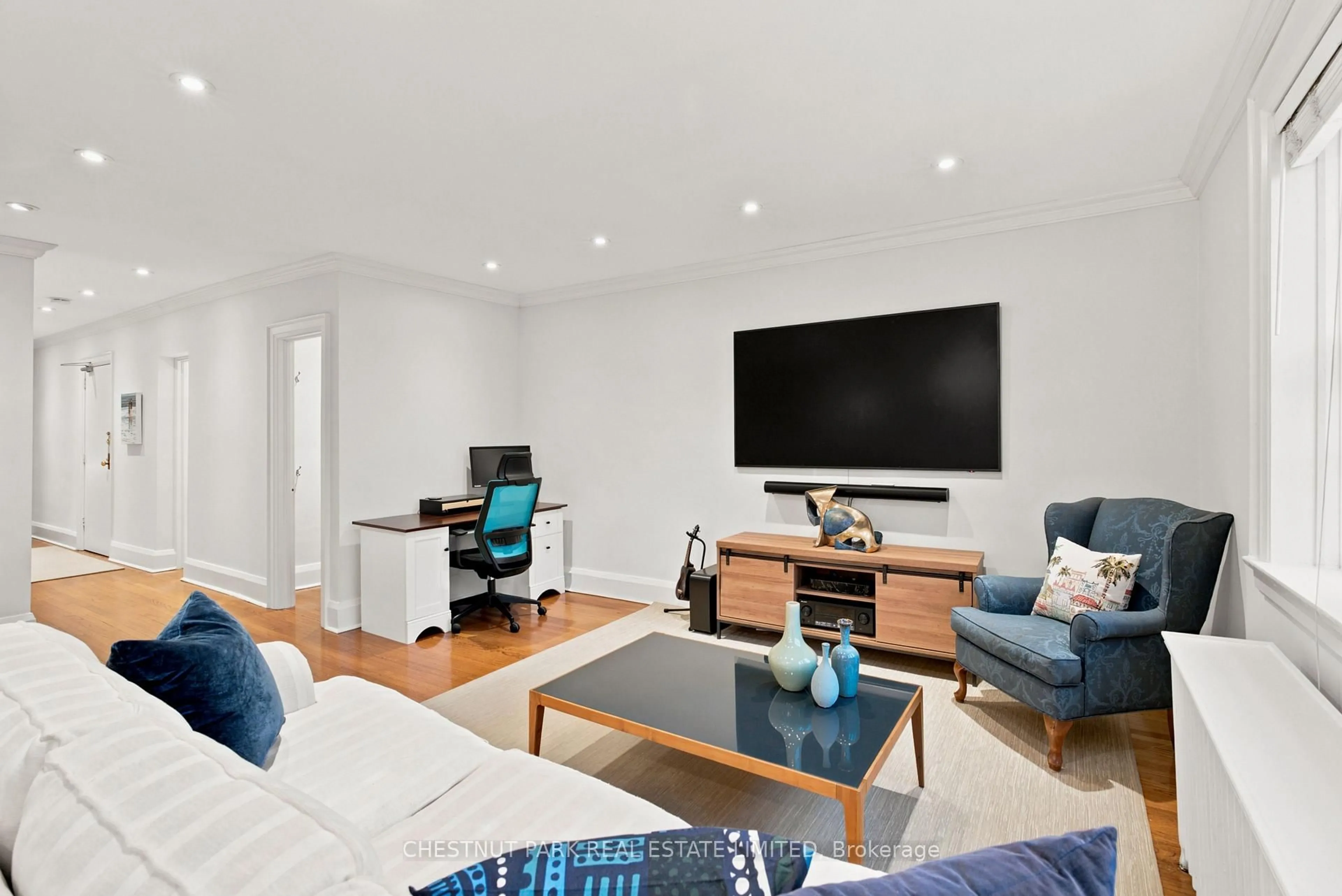 Living room with furniture, wood/laminate floor for 480 Oriole Pkwy #303, Toronto Ontario M5P 2H8
