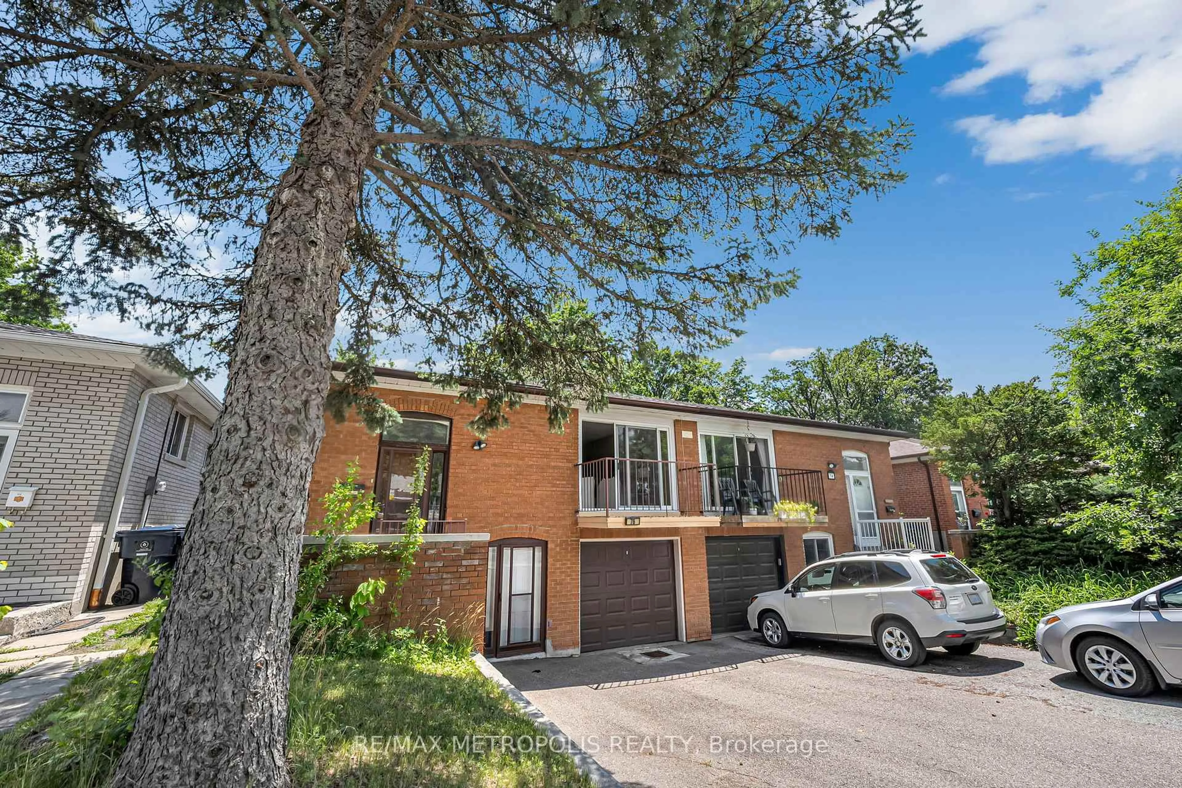 Home with brick exterior material, street for 76 Harrington Cres, Toronto Ontario M2M 2Y5