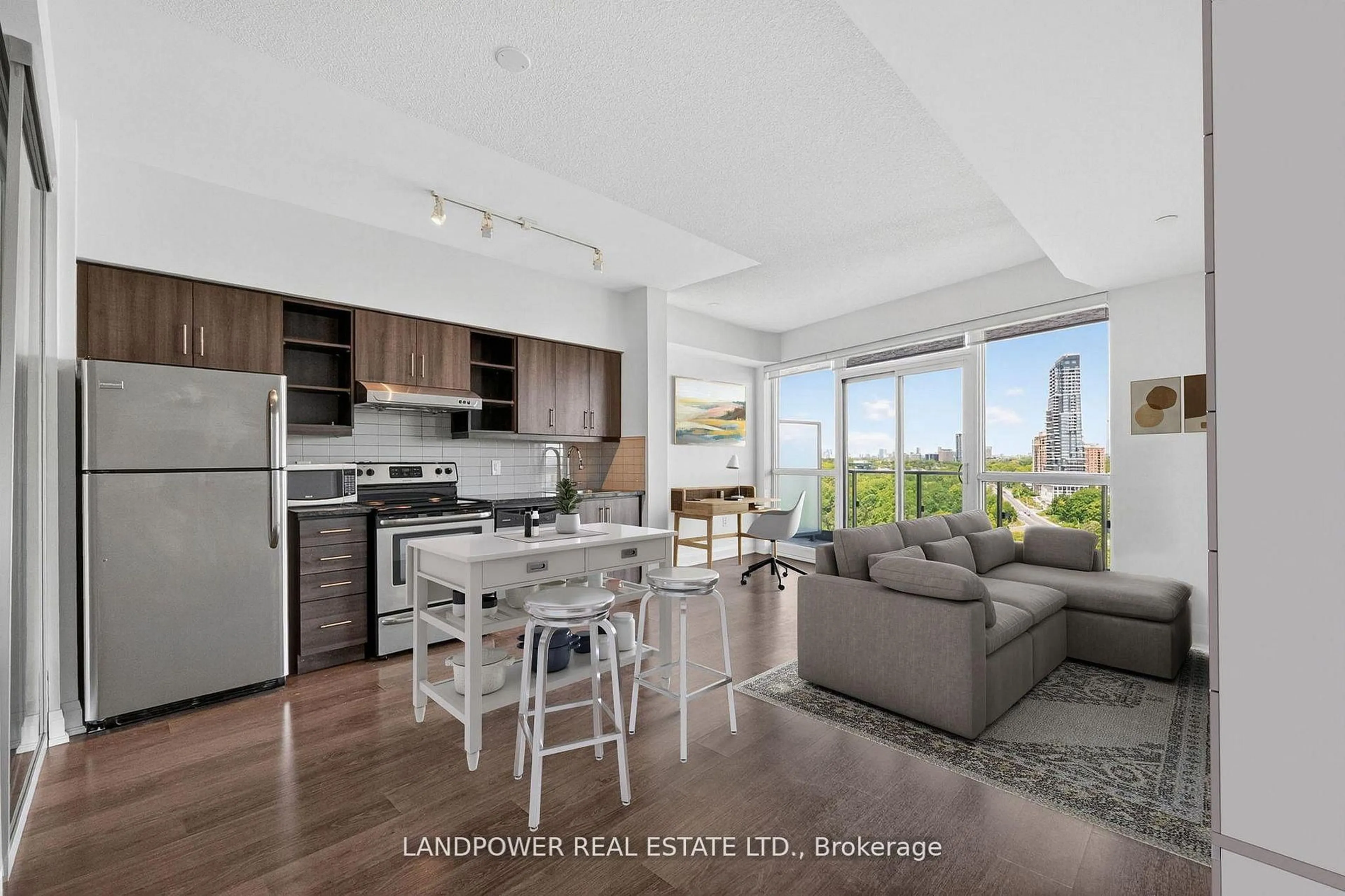 Open concept kitchen, wood/laminate floor for 160 Vanderhoof Ave #1203, Toronto Ontario M4G 0B7