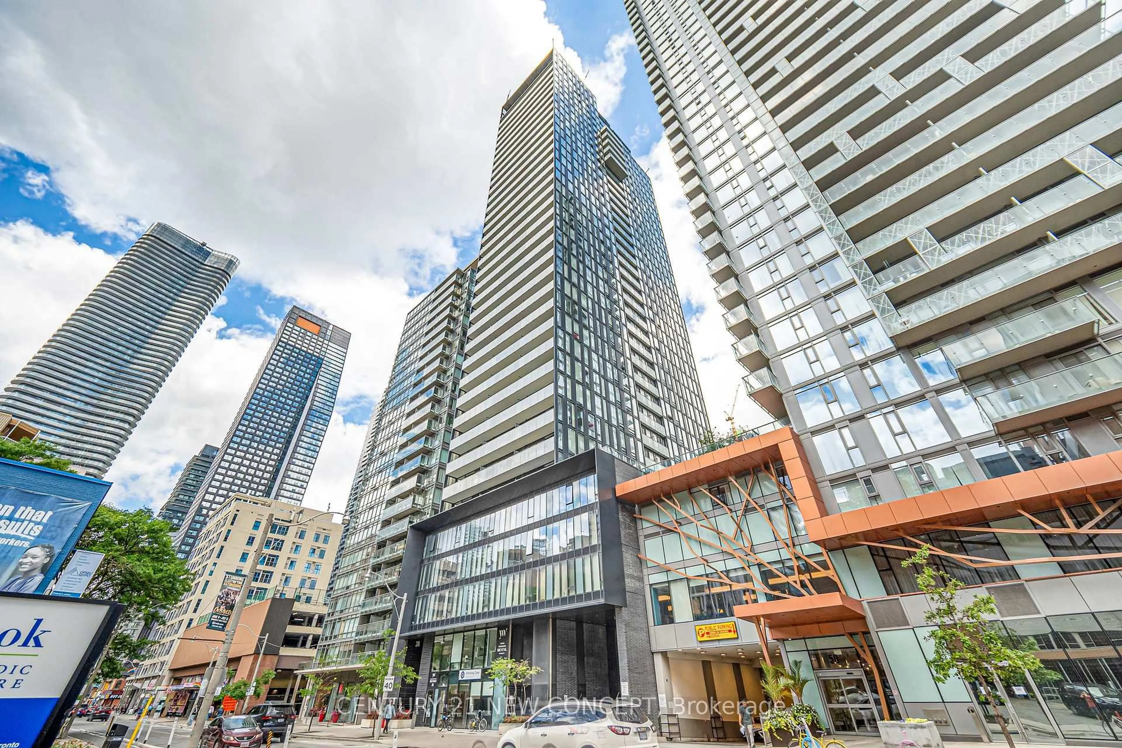 Patio, city buildings view from balcony for 28 Wellesley St #1902, Toronto Ontario M4Y 0C4