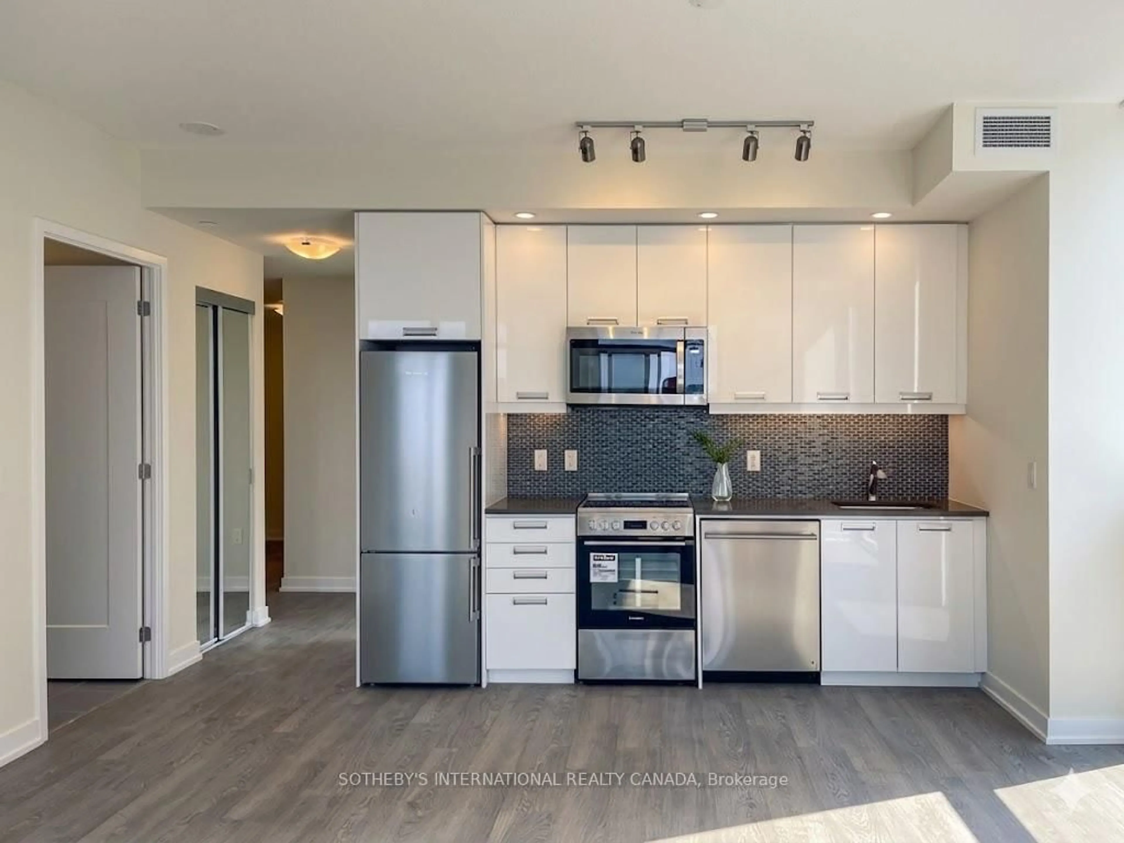 Open concept kitchen, wood/laminate floor for 99 John St #3807, Toronto Ontario M5V 0S6