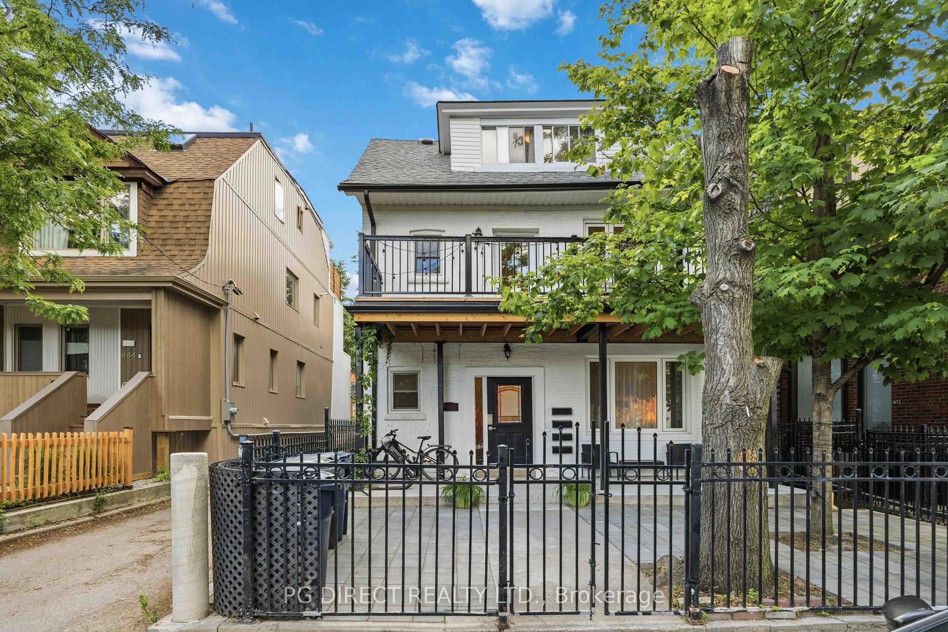 Home with brick exterior material, street for 486 Montrose Ave, Toronto Ontario M6G 3H1