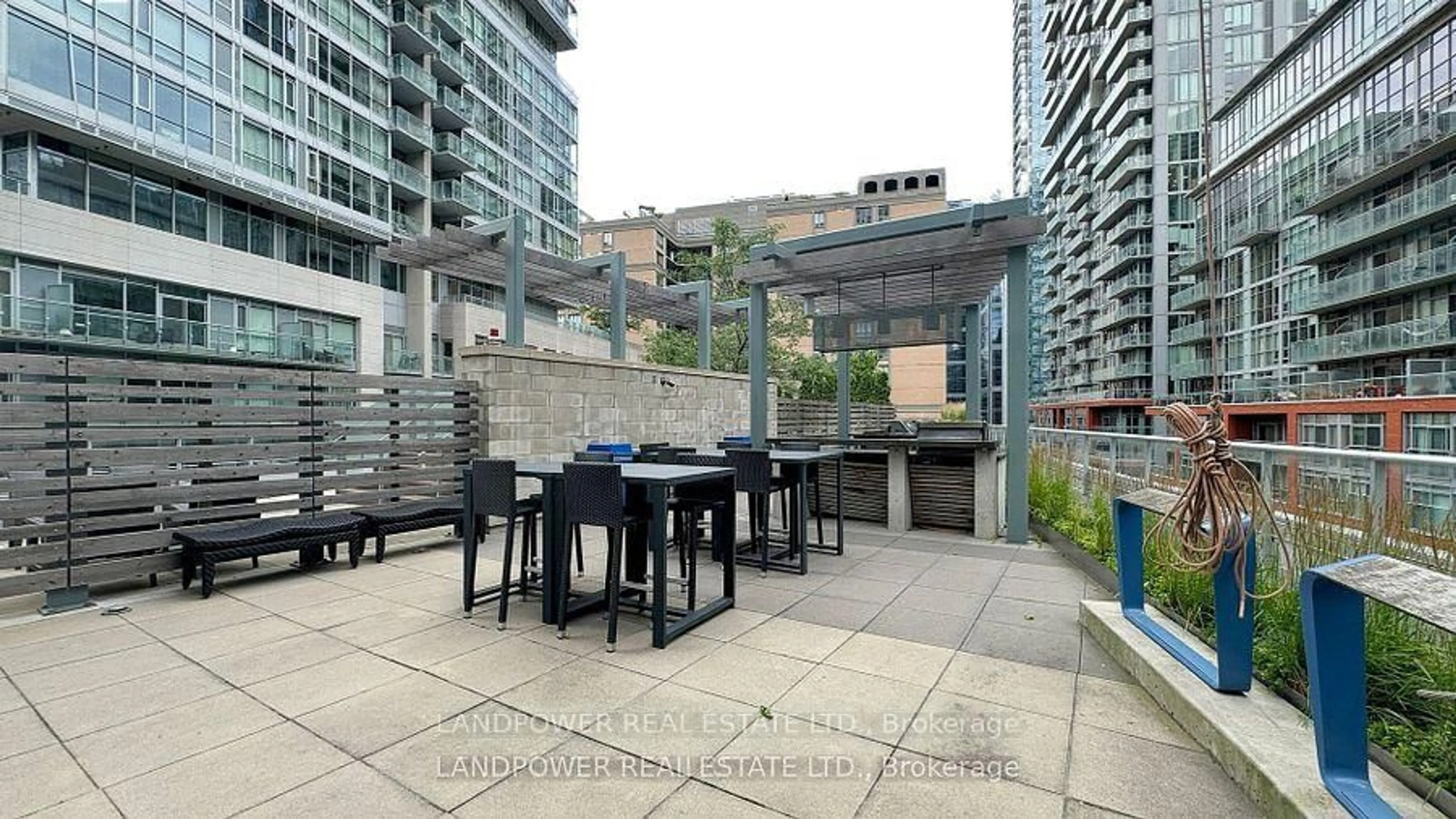 Patio, city buildings view from balcony for 30 Nelson St #3702, Toronto Ontario M5V 0H5