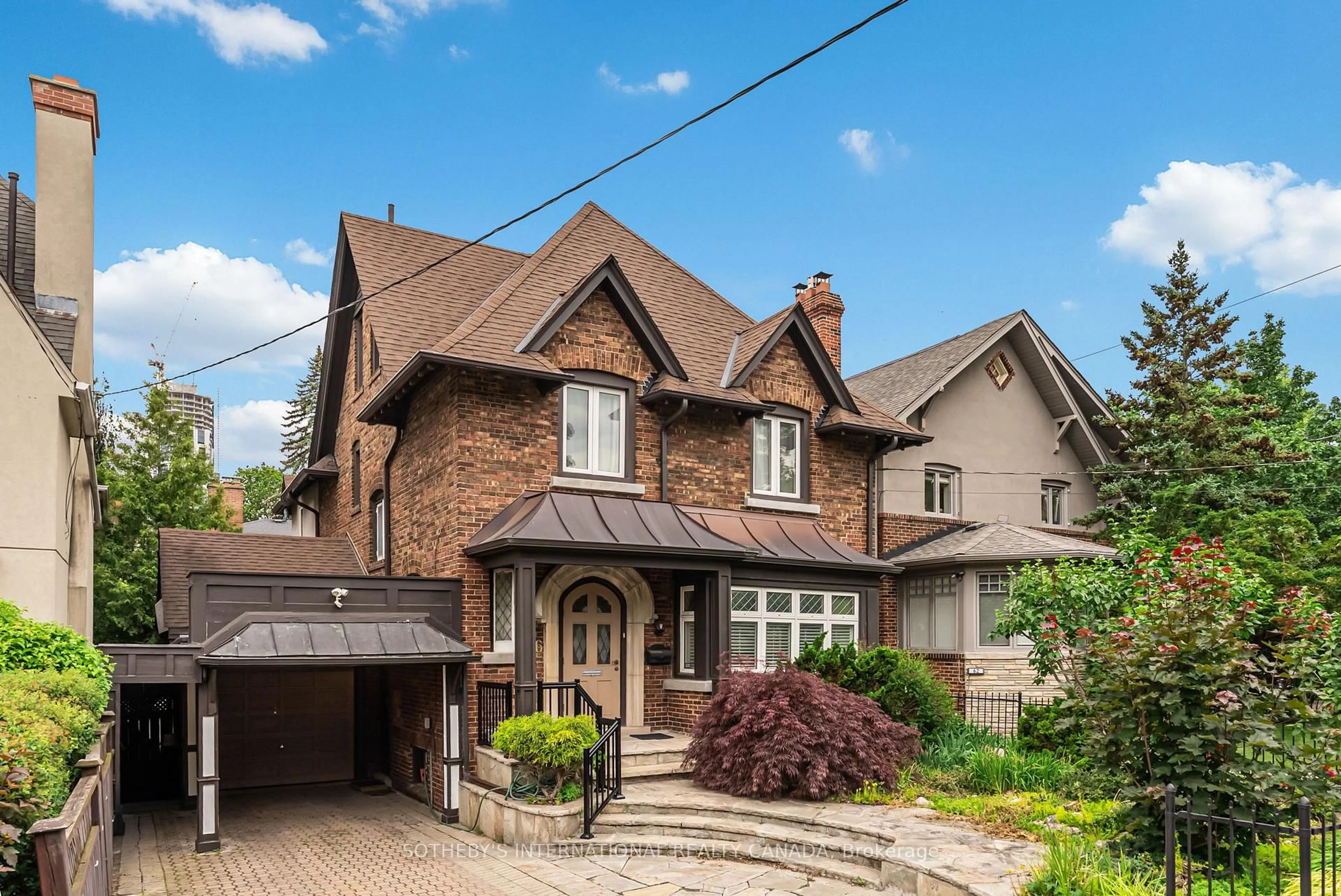 Home with brick exterior material, street for 66 Inglewood Dr, Toronto Ontario M4T 1H3