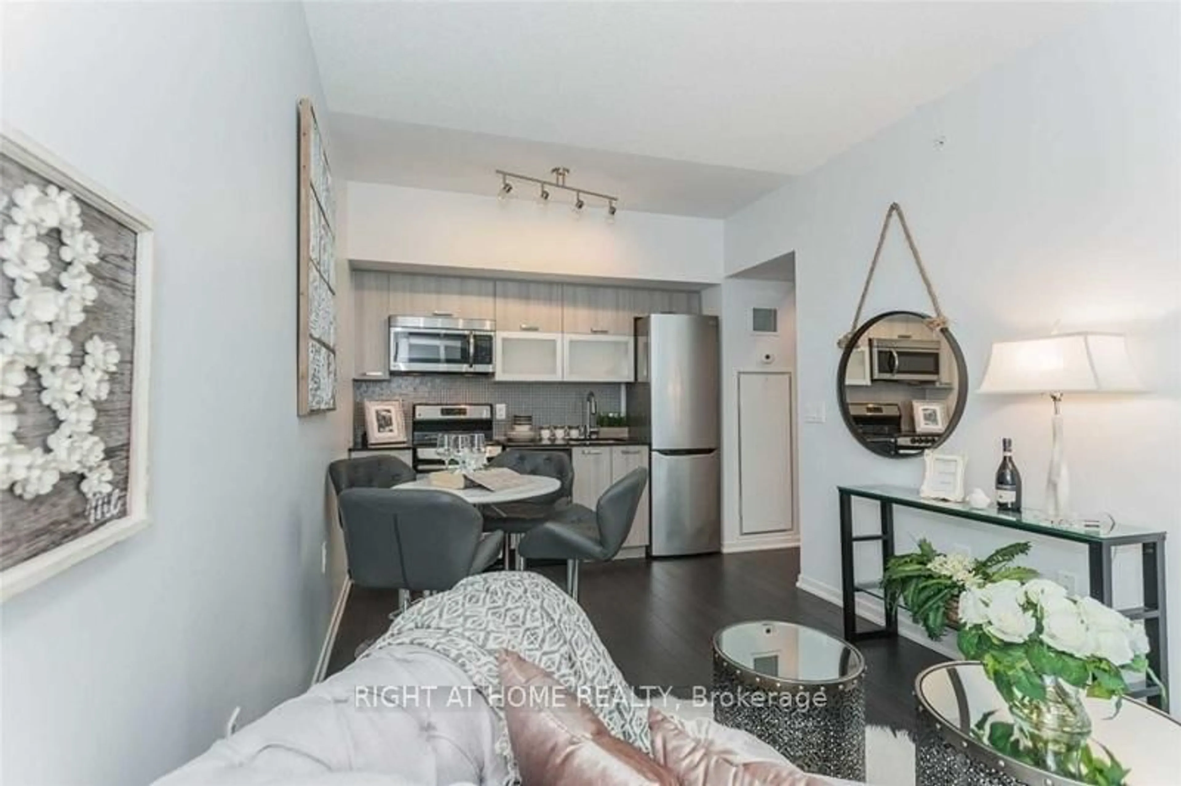 Open concept kitchen, wood/laminate floor for 36 Lisgar St #812W, Toronto Ontario M6J 0C7