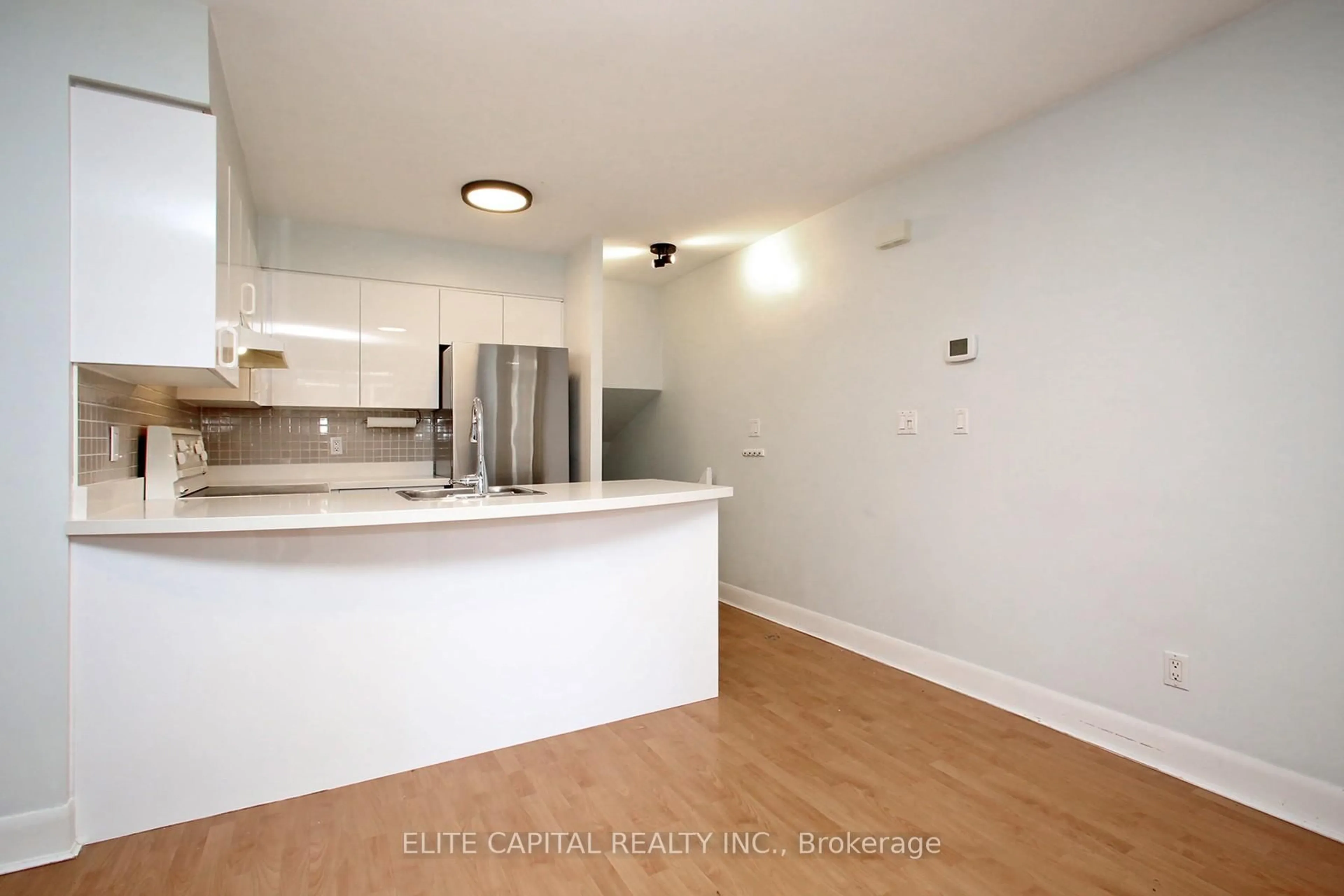 Open concept kitchen, wood/laminate floor for 415 Jarvis St #369, Toronto Ontario M4Y 3C1