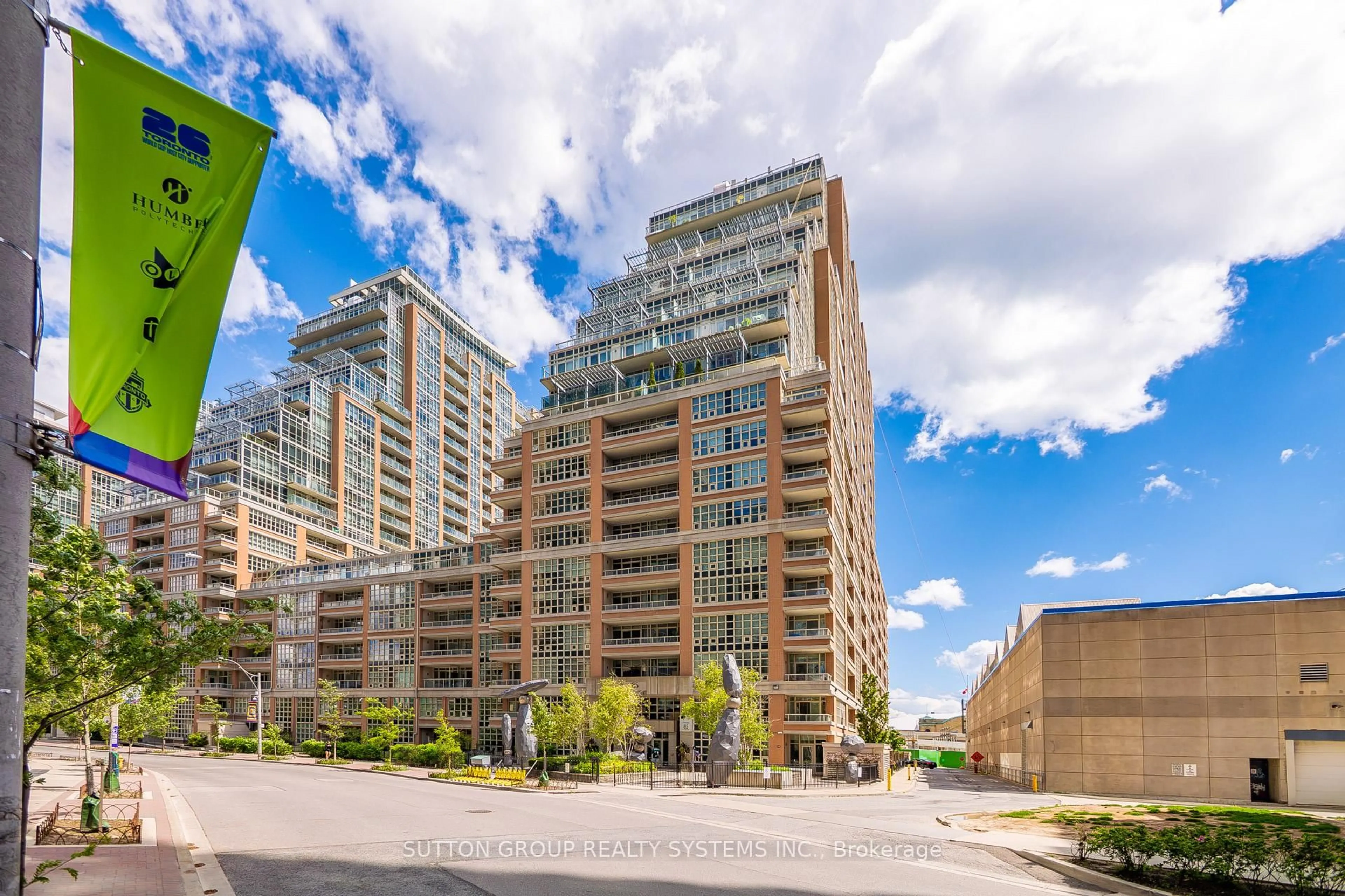 Patio, city buildings view from balcony for 85 East Liberty St #607, Toronto Ontario M6K 3R4