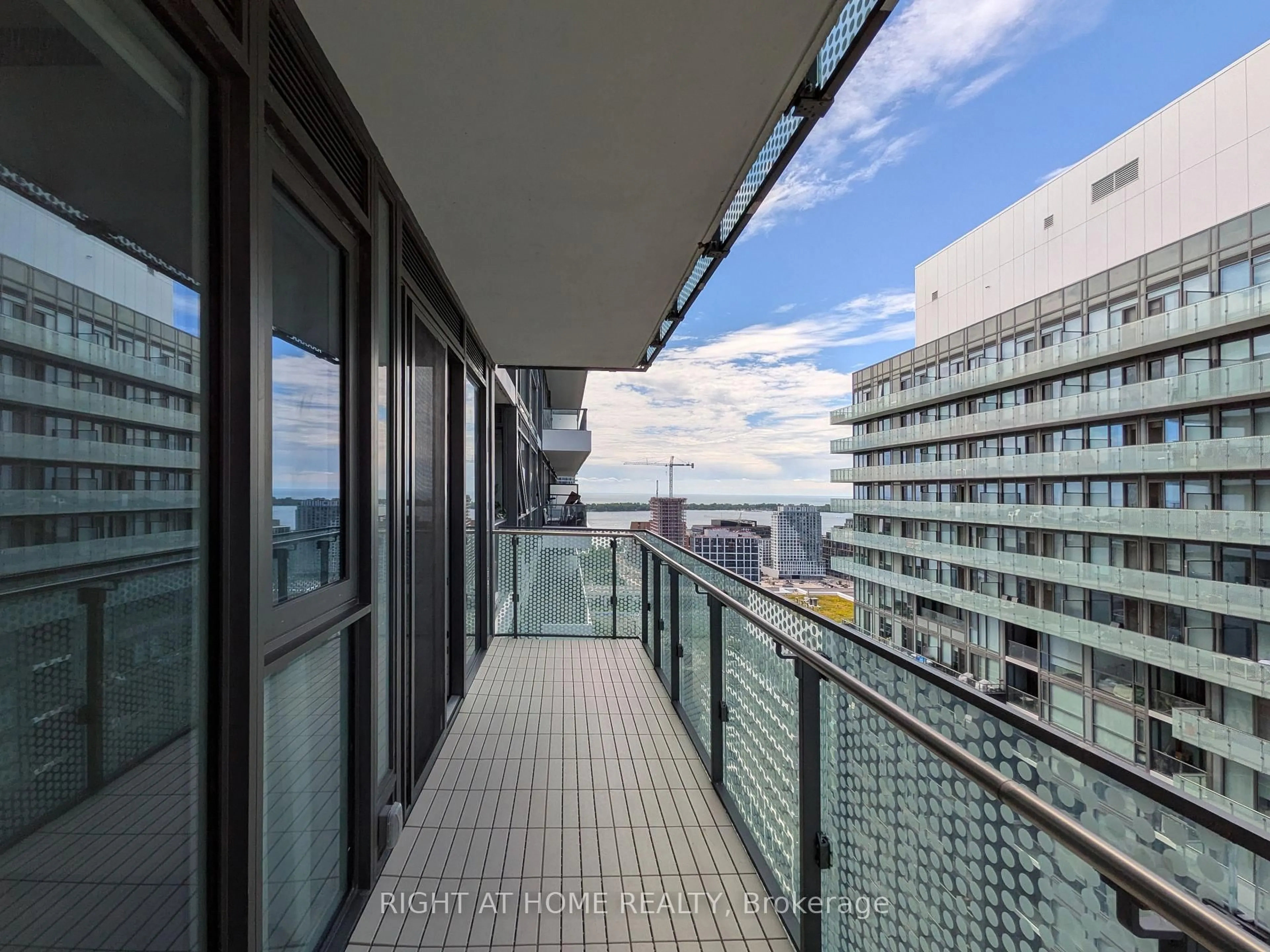 Balcony in the apartment, city buildings view from balcony for 70 Princess St #2715, Toronto Ontario M5A 0X6