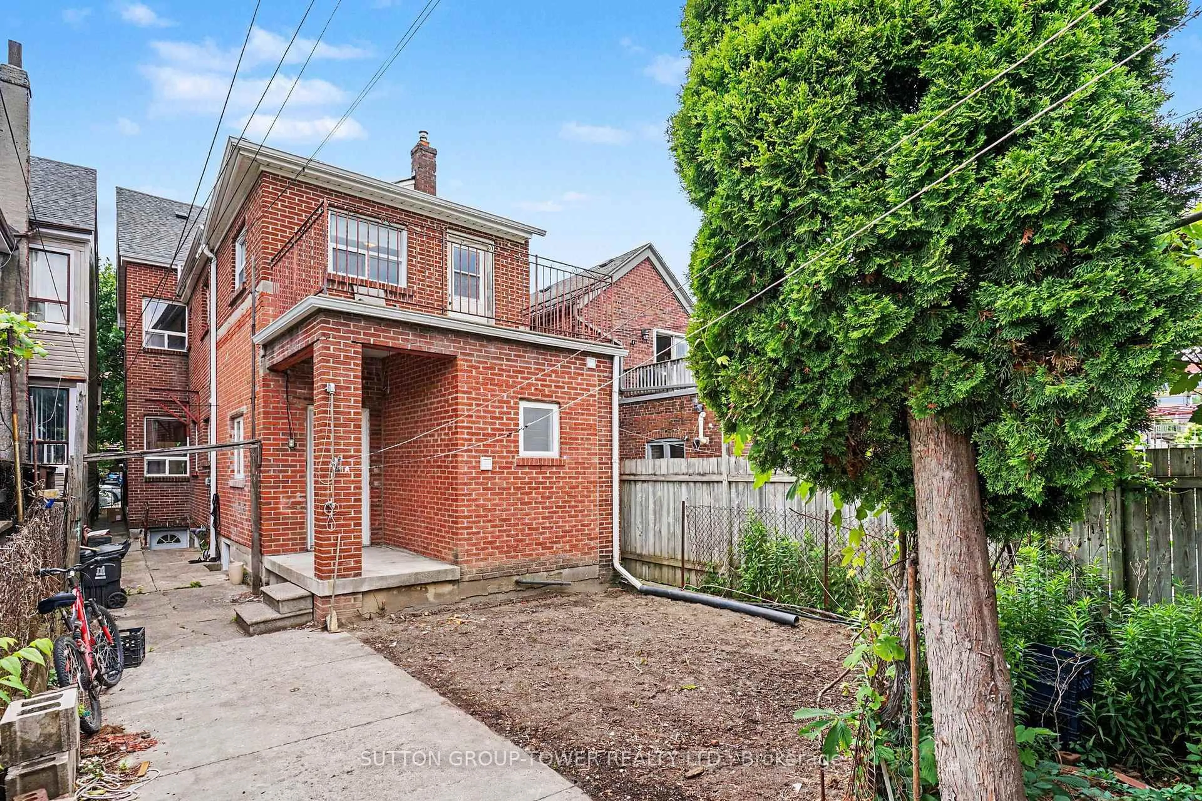 Home with brick exterior material, street for 329 Euclid Ave, Toronto Ontario M6J 2K1