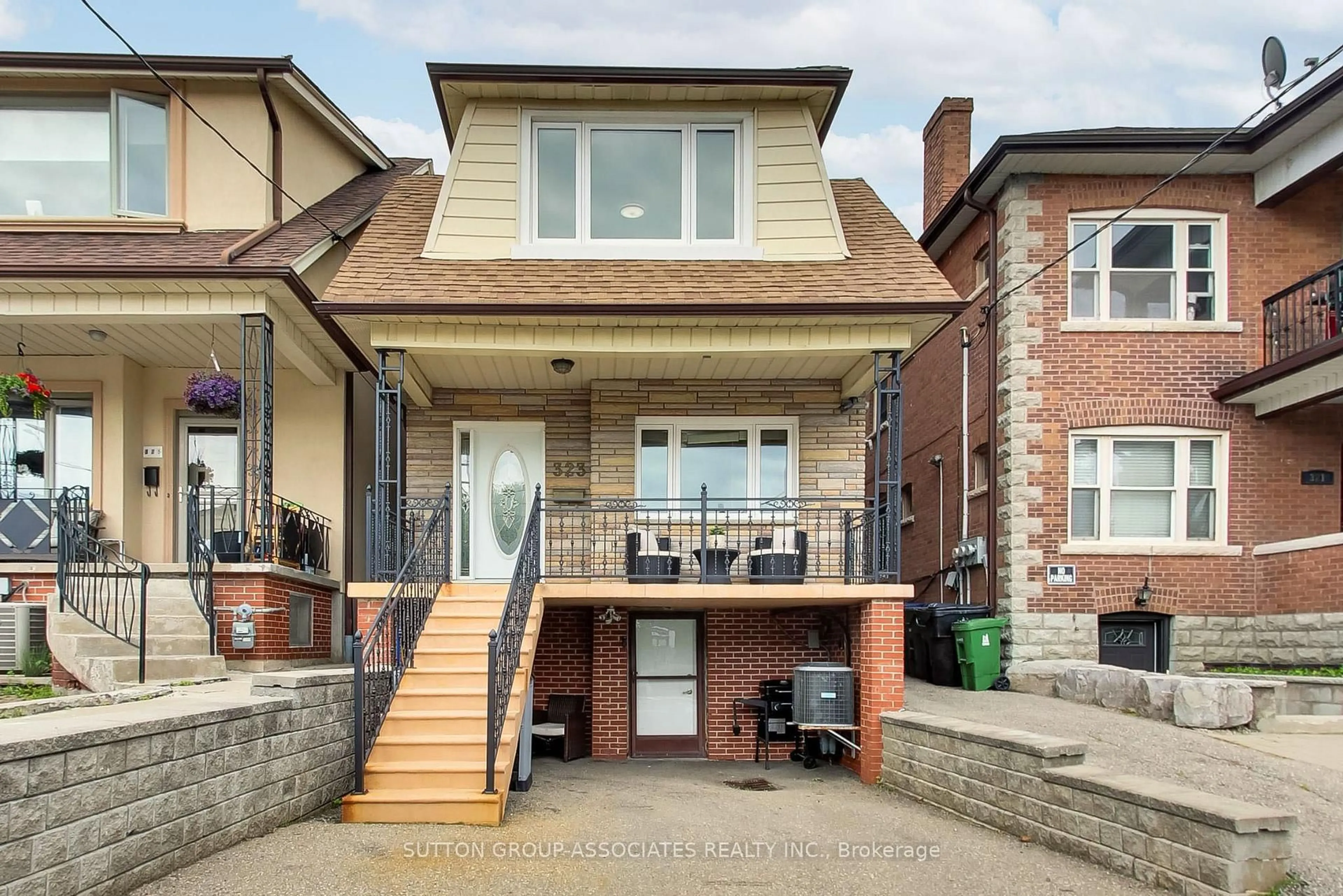 Home with brick exterior material, street for 323 Lauder Ave, Toronto Ontario M6E 3H7