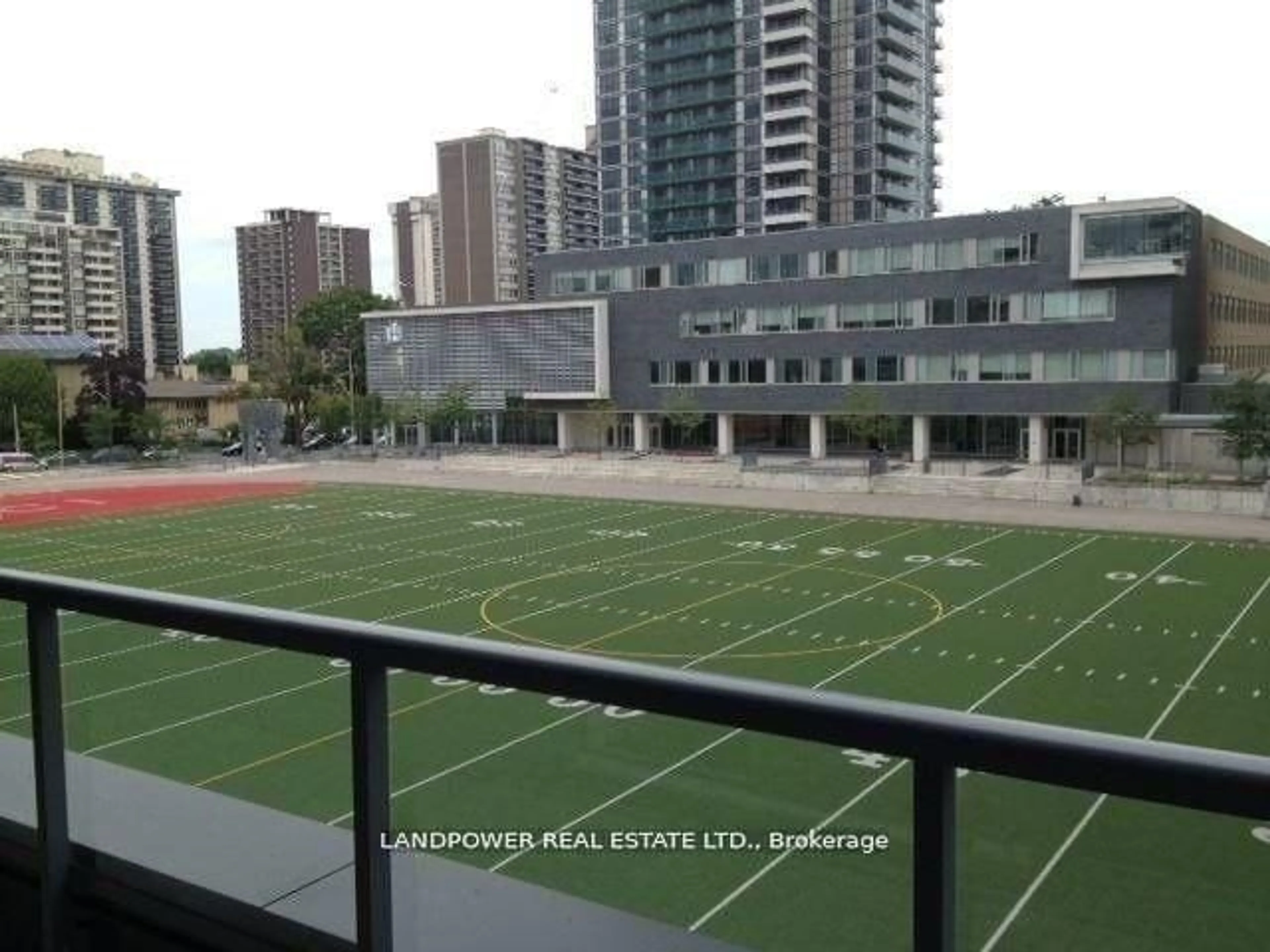 Patio, city buildings view from balcony for 30 Roehampton Ave #313, Toronto Ontario M4P 0B9