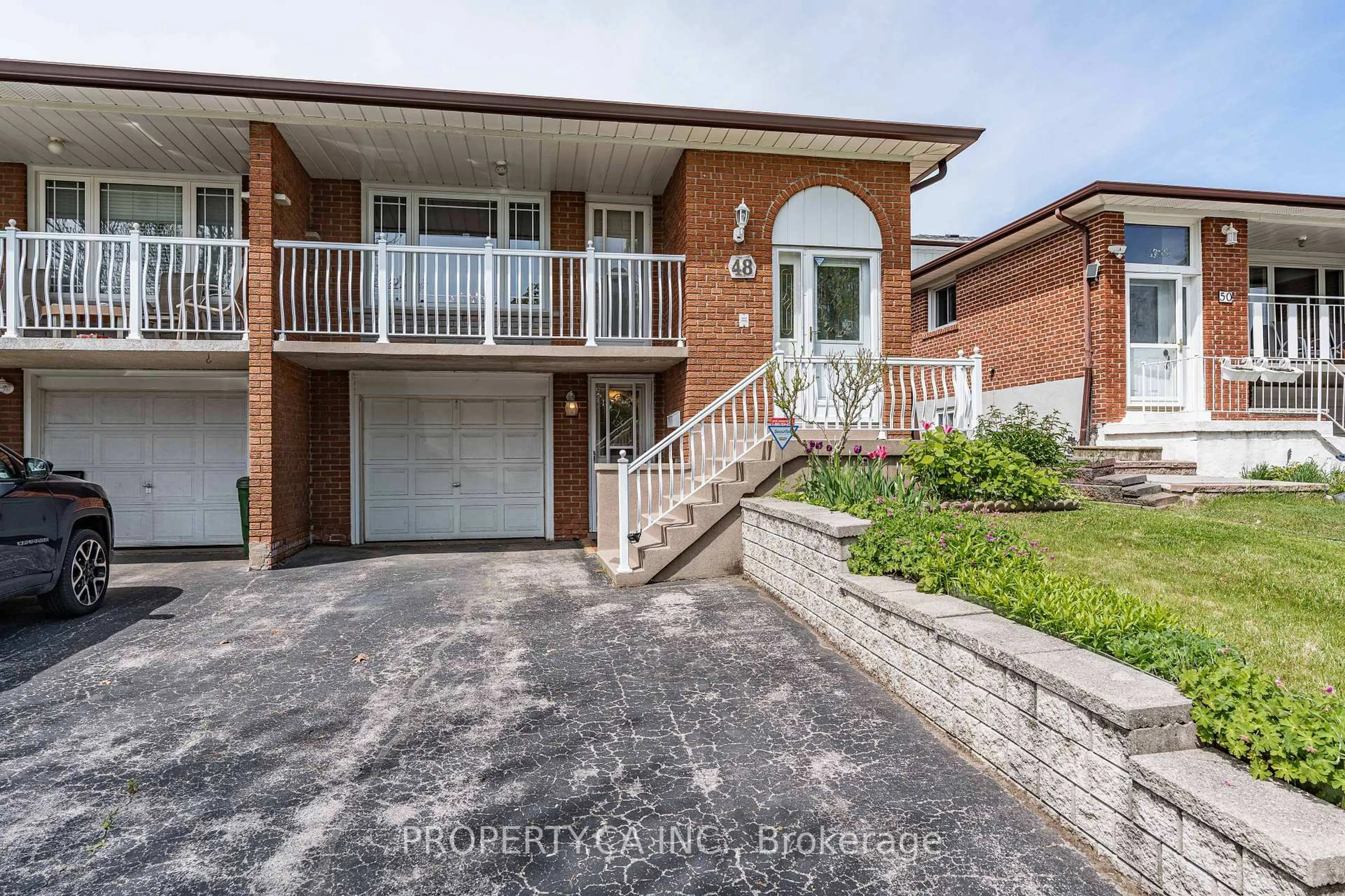 Home with brick exterior material, street for 48 Navaho Dr, Toronto Ontario M2H 2X3
