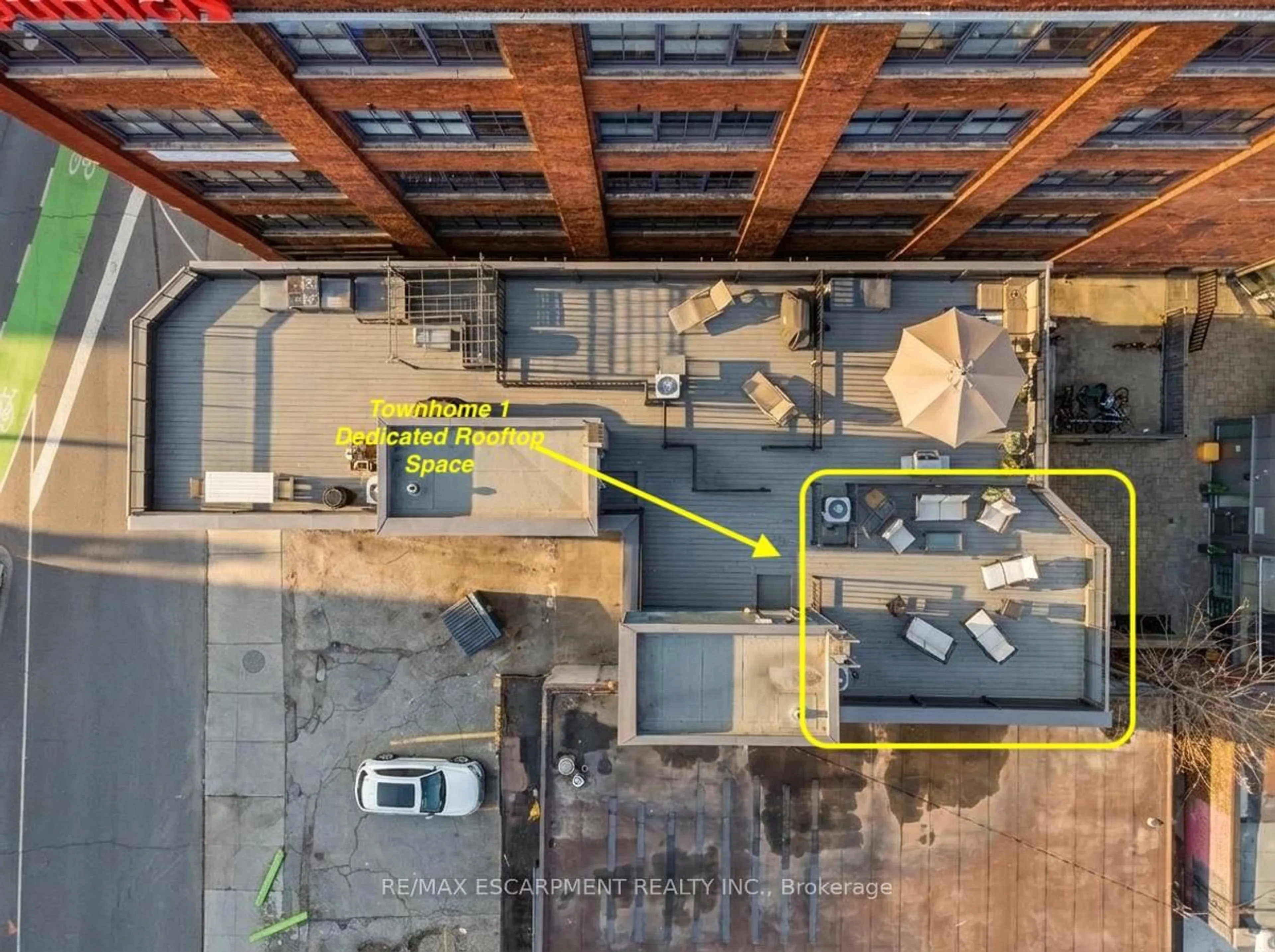A pic from outside/outdoor area/front of a property/back of a property/a pic from drone, city buildings view from balcony for 127 Queen St #TH1, Toronto Ontario M5C 1S3