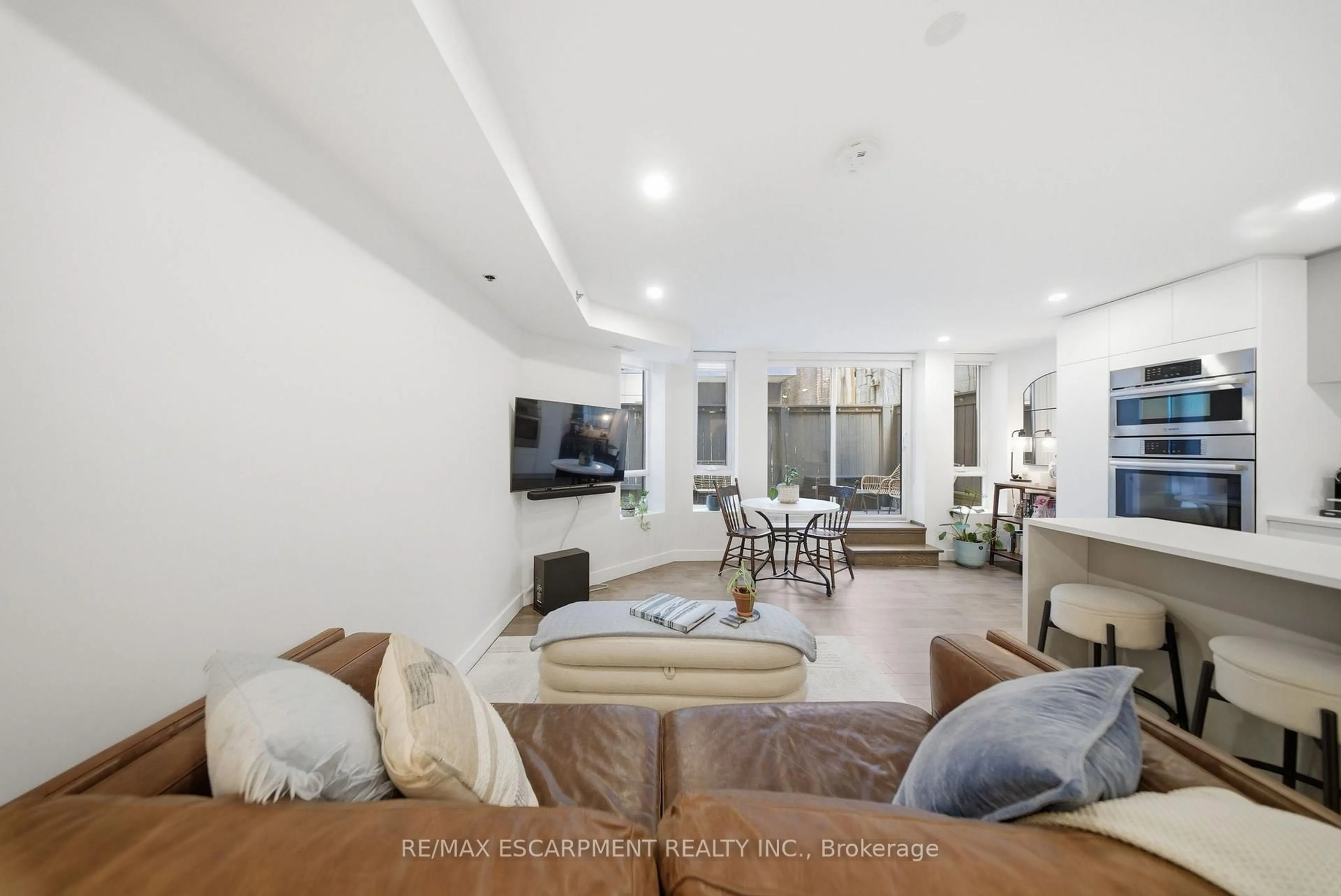 Living room with furniture, unknown for 127 Queen St #TH1, Toronto Ontario M5C 1S3