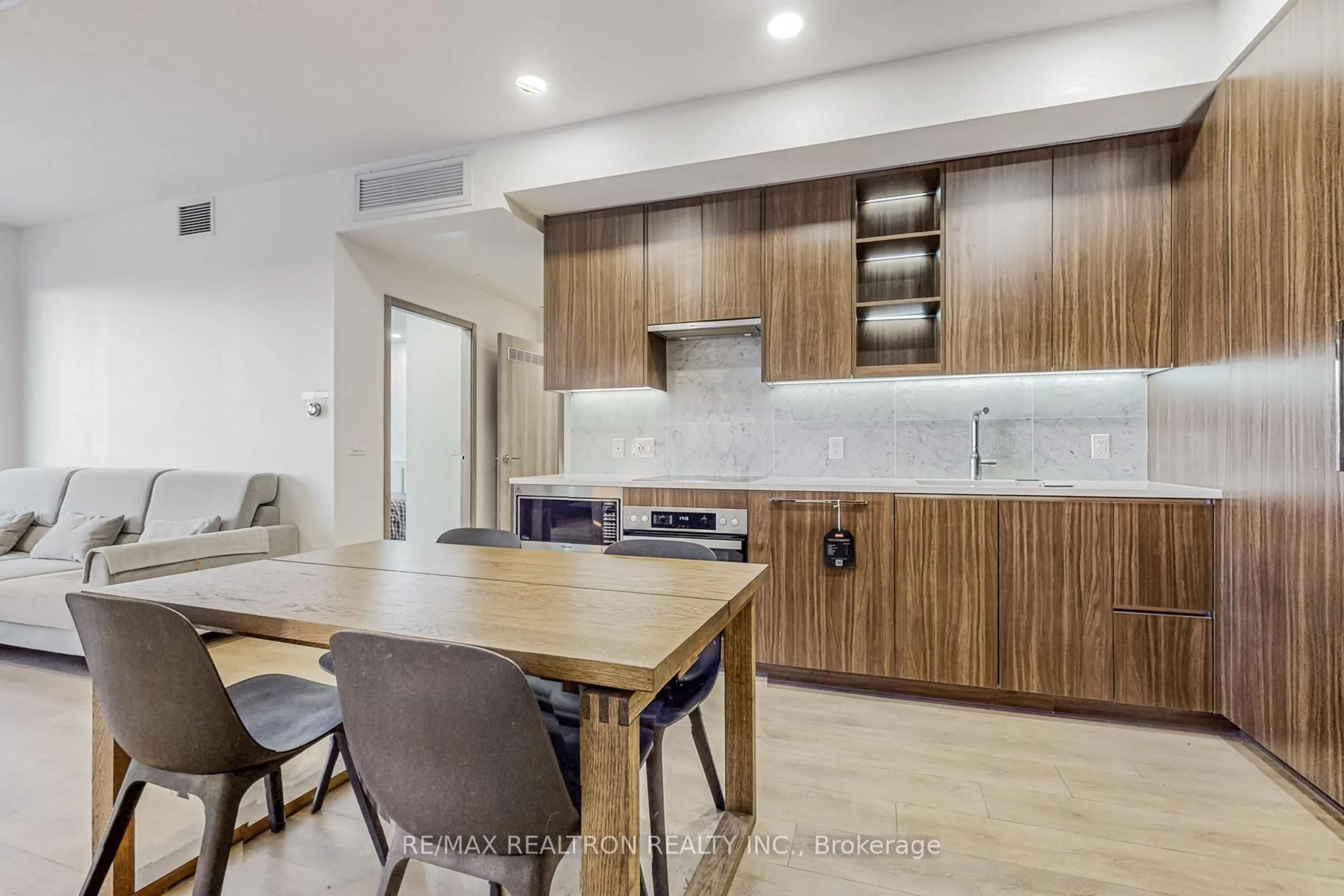 Open concept kitchen, wood/laminate floor for 85 Mcmahon Dr #3106, Toronto Ontario M2K 0H1