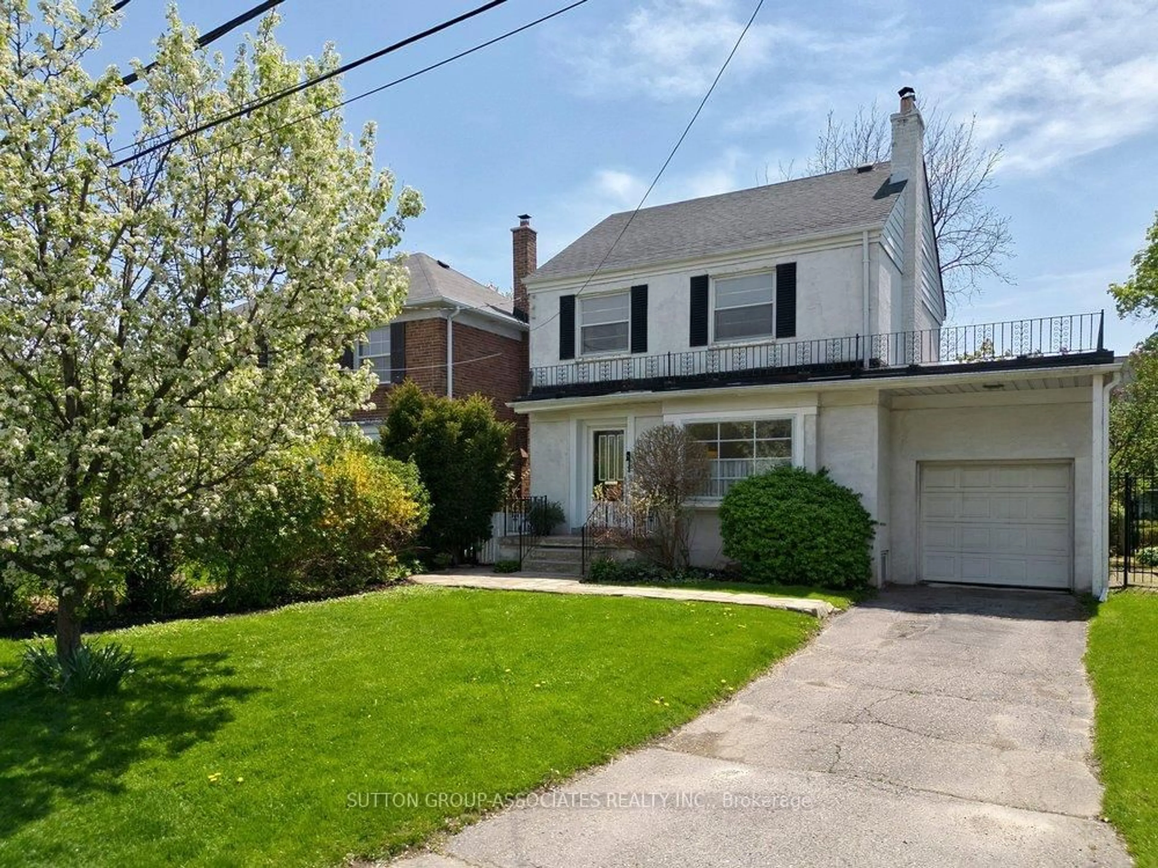 Home with vinyl exterior material, street for 5 Delhi Ave, Toronto Ontario M5M 3B5