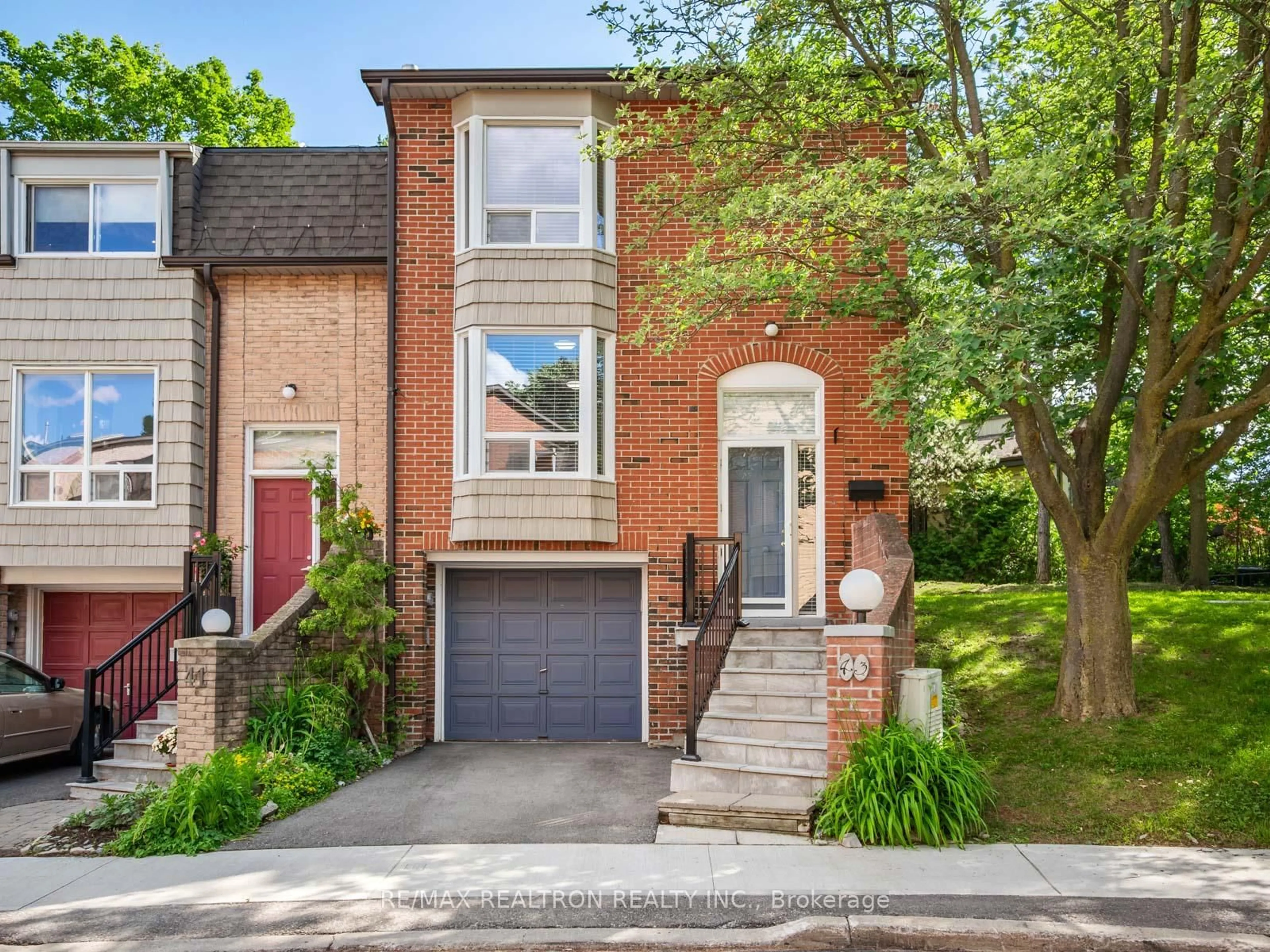 Home with brick exterior material, street for 43 Wild Gingerway Rd, Toronto Ontario M3H 5W9