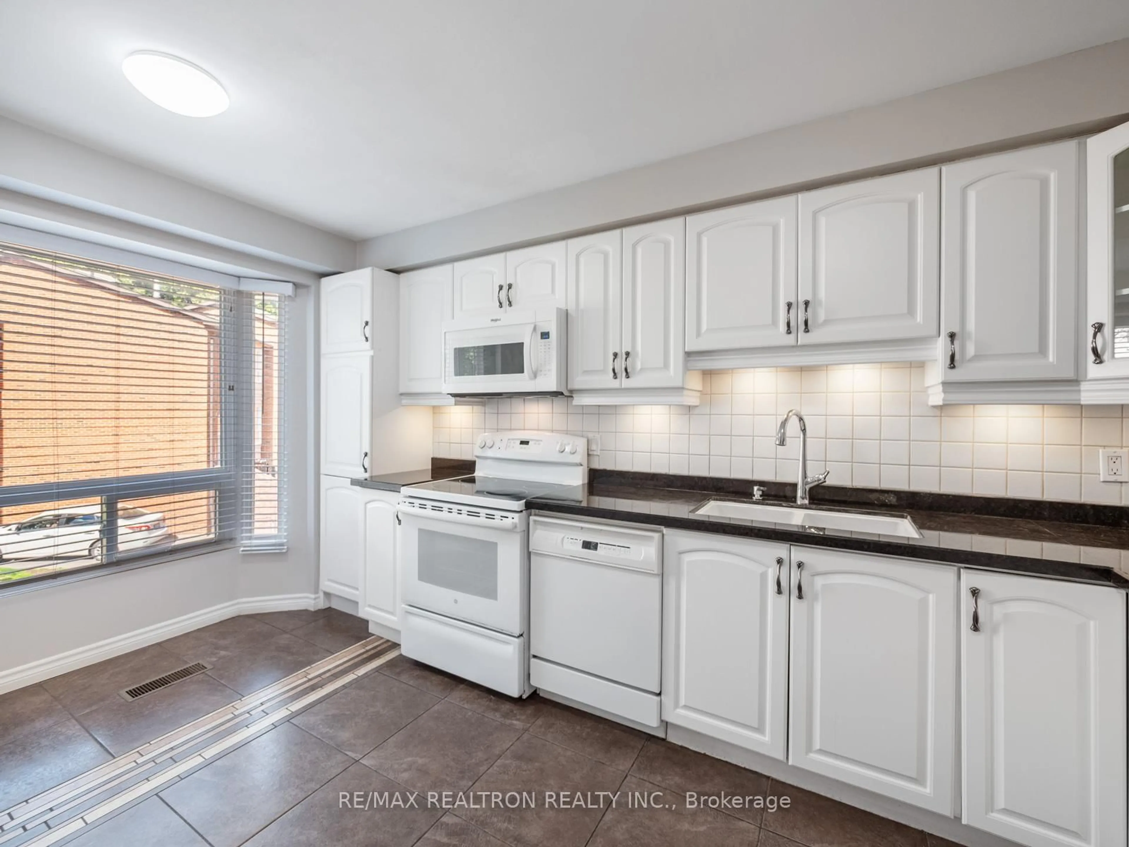 Standard kitchen, ceramic/tile floor for 43 Wild Gingerway Rd, Toronto Ontario M3H 5W9