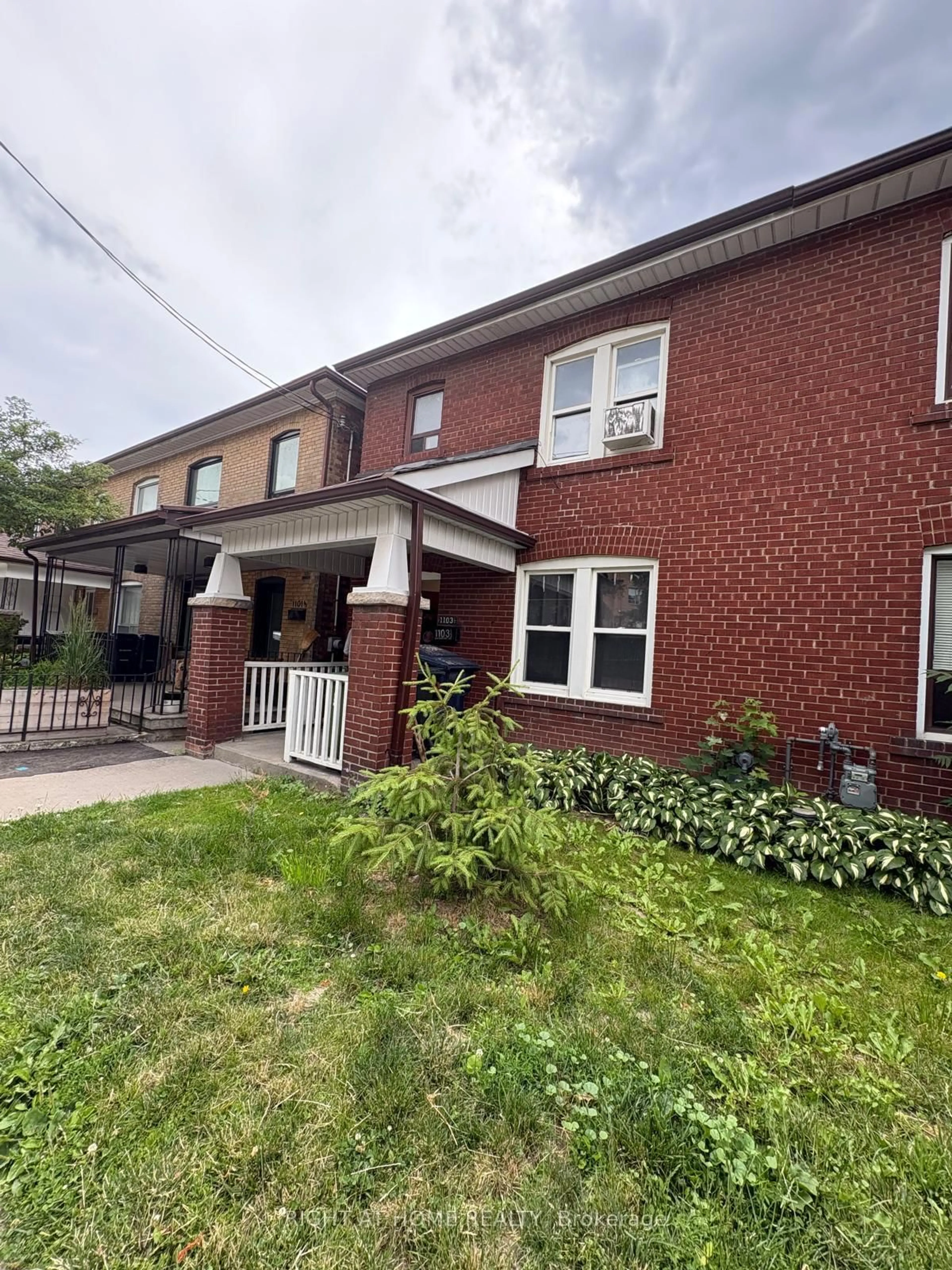 Home with brick exterior material, street for 1103 1/2 Davenport Rd, Toronto Ontario M6G 2C3