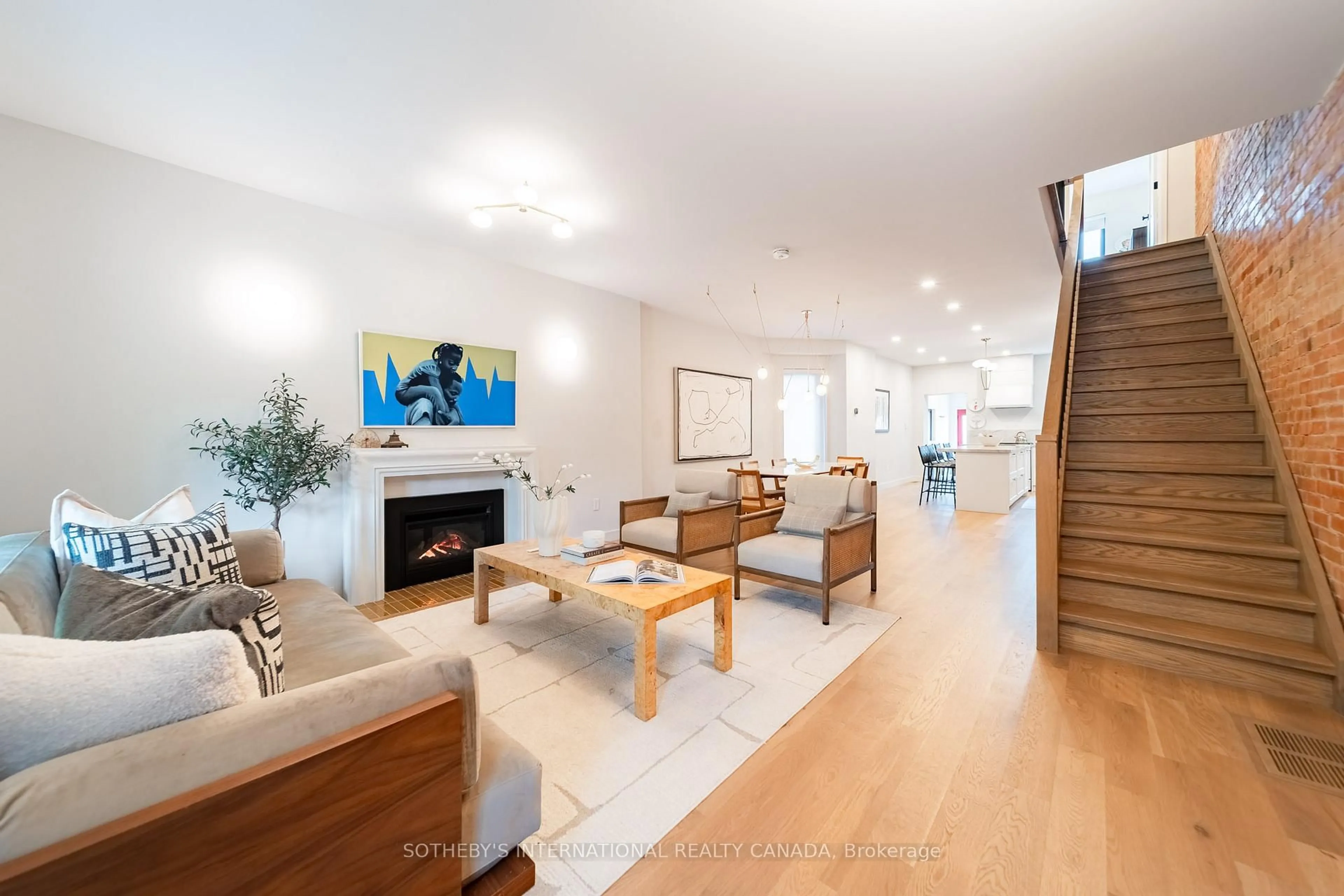 Living room with furniture, wood/laminate floor for 204 Grace St, Toronto Ontario M6G 3A6