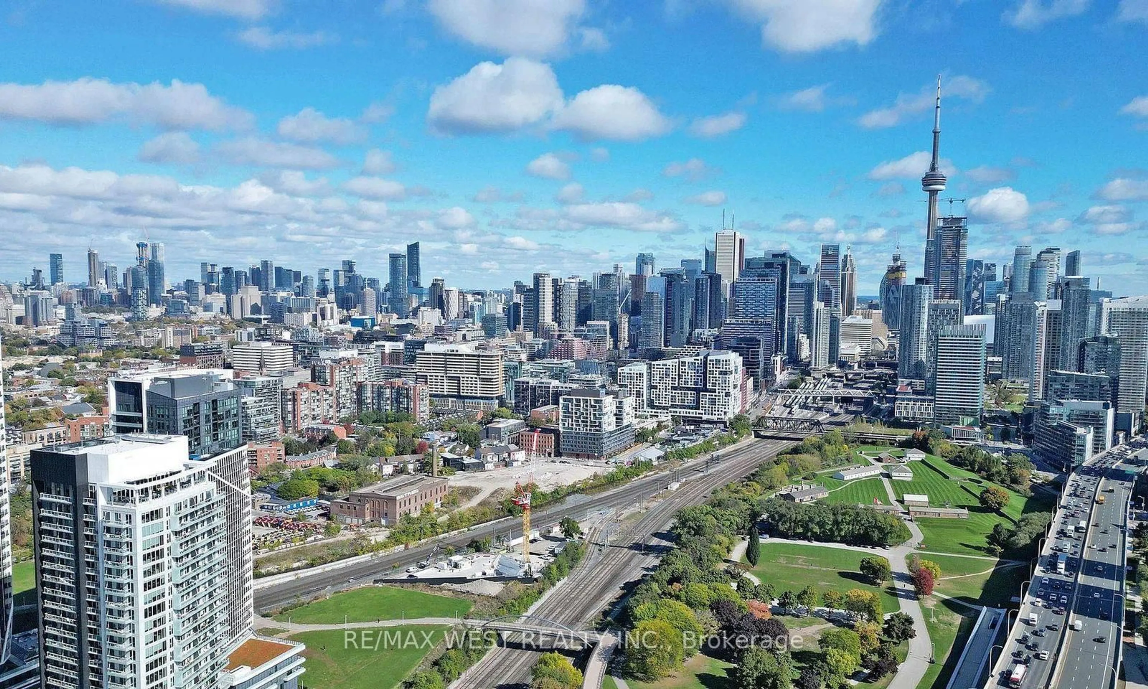 A pic from outside/outdoor area/front of a property/back of a property/a pic from drone, city buildings view from balcony for 50 Ordnance St #1411, Toronto Ontario M6K 1A2