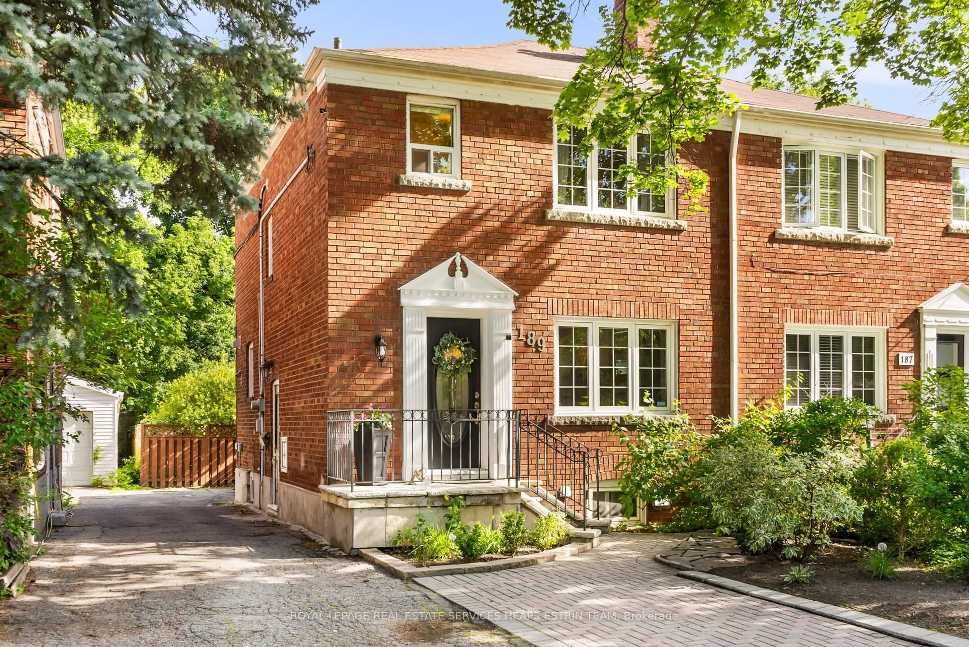 Home with brick exterior material, street for 189 Donlea Dr, Toronto Ontario M4G 2N1