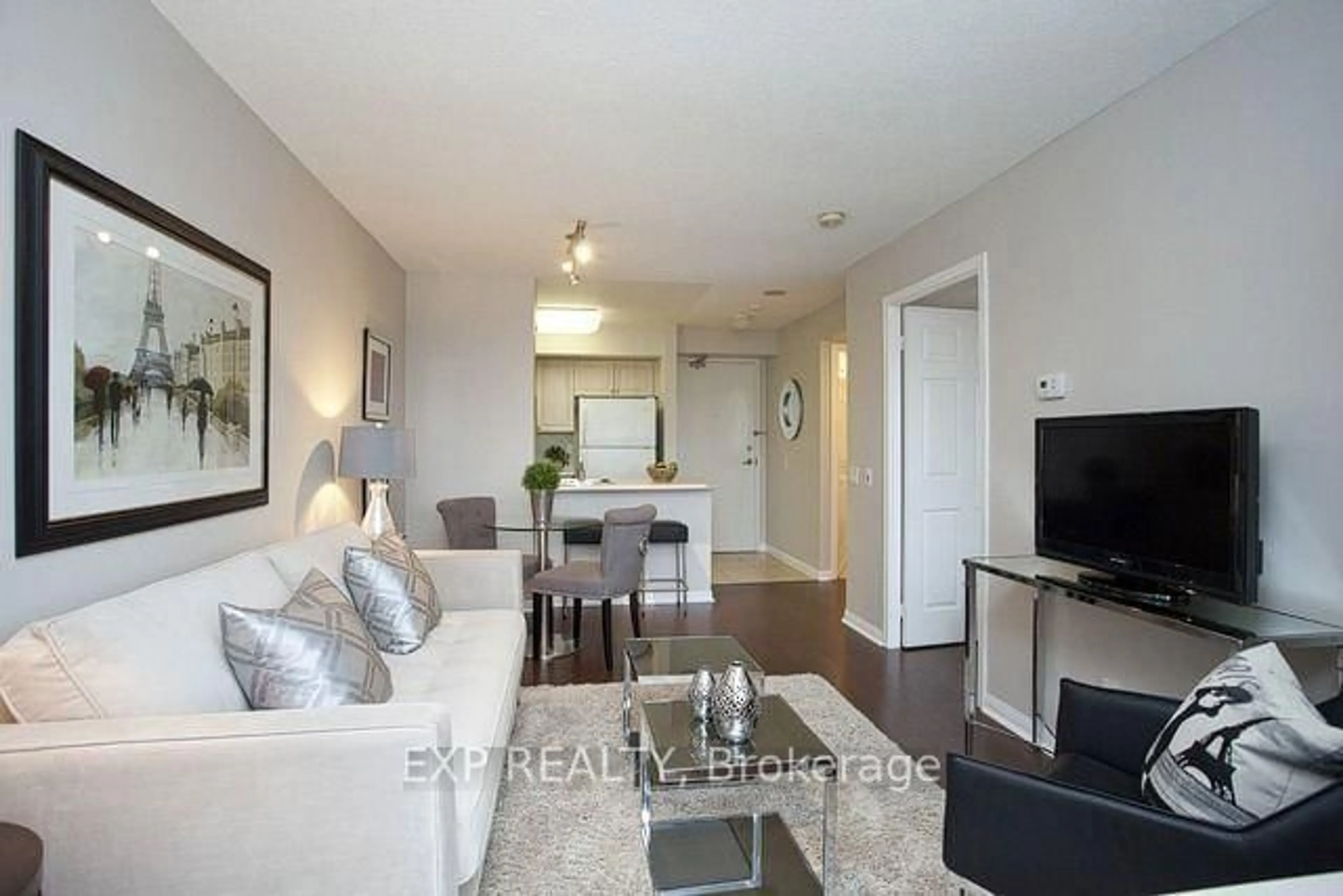 Living room with furniture, wood/laminate floor for 153 Beecroft Rd #706, Toronto Ontario M2N 7C5