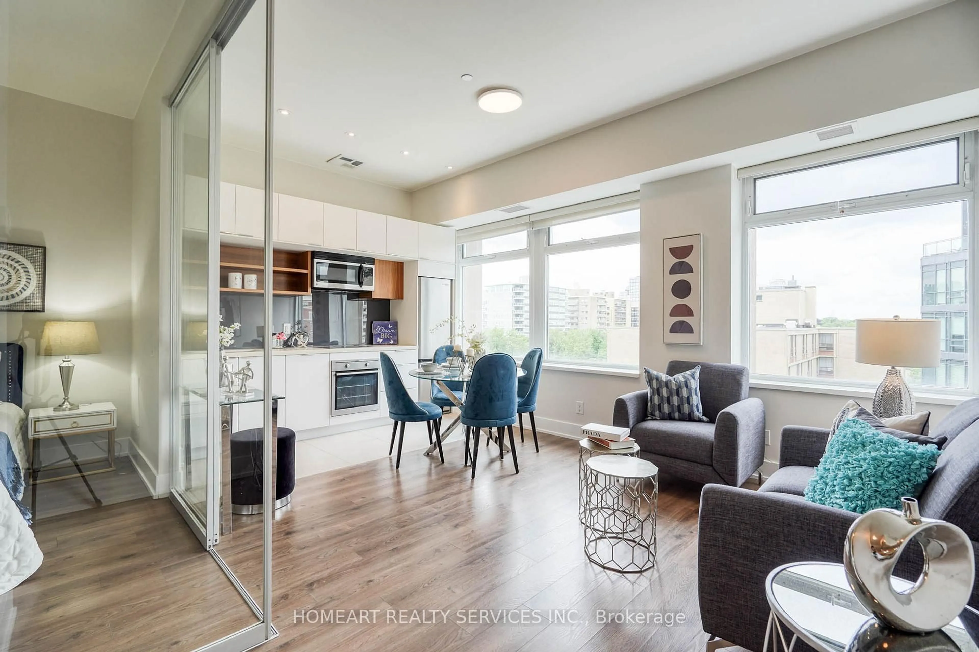 Open concept kitchen, wood/laminate floor for 111 St Clair Ave #701, Toronto Ontario M4V 1N5