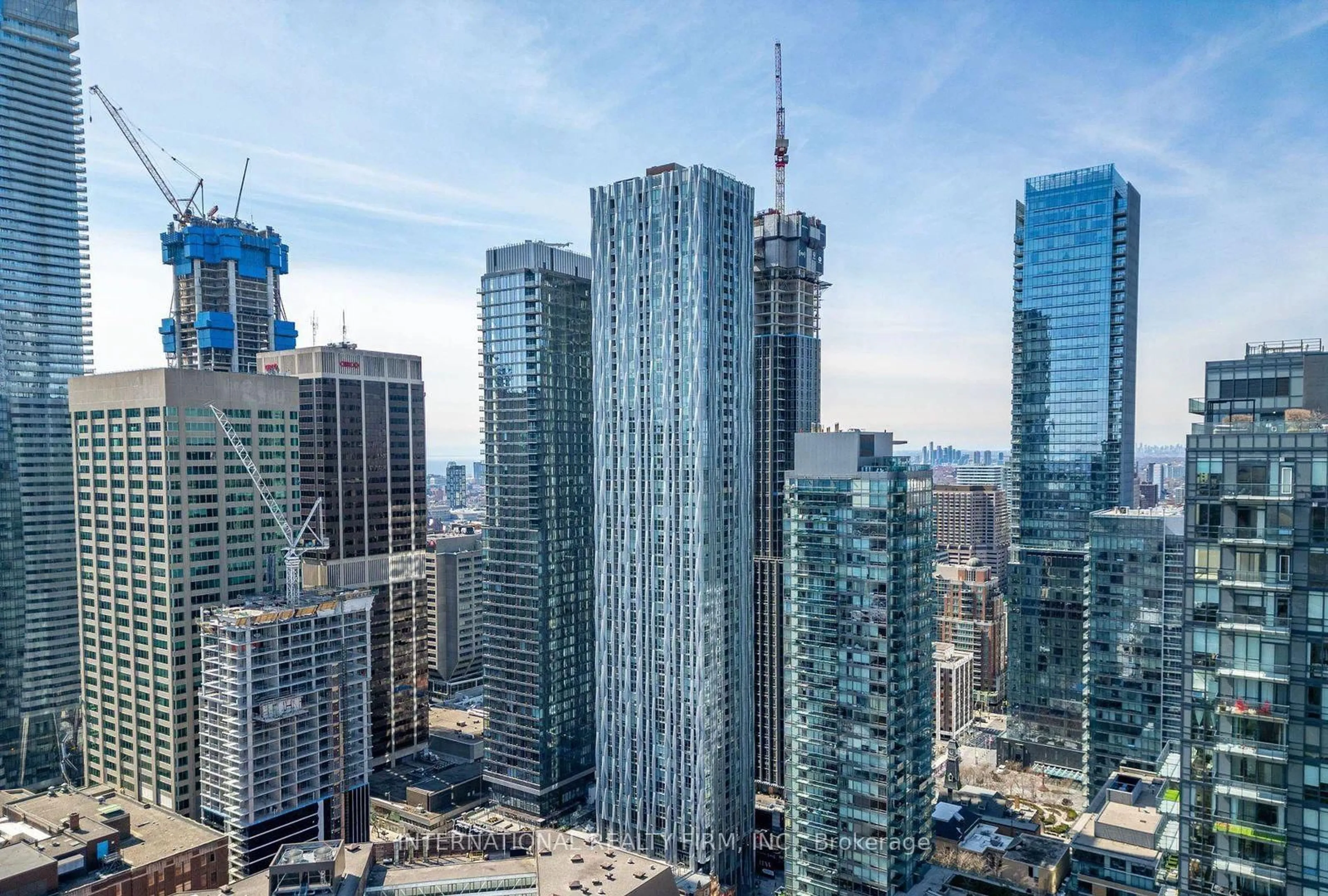 A pic from outside/outdoor area/front of a property/back of a property/a pic from drone, city buildings view from balcony for 1 Yorkville Ave #5409, Toronto Ontario M4W 0B1