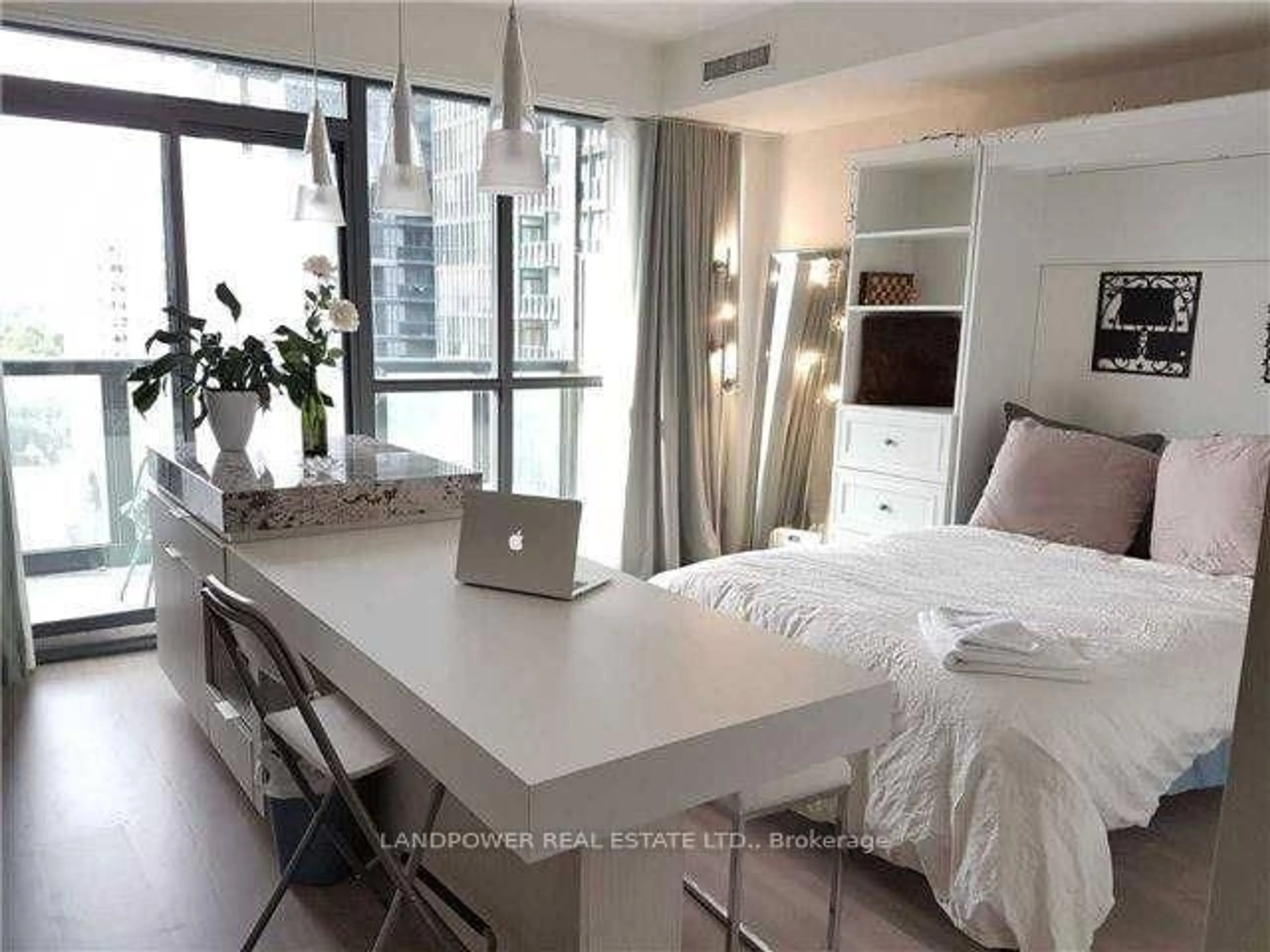 Bedroom with bed, wood/laminate floor for 101 Charles St #1607, Toronto Ontario M4Y 0A9