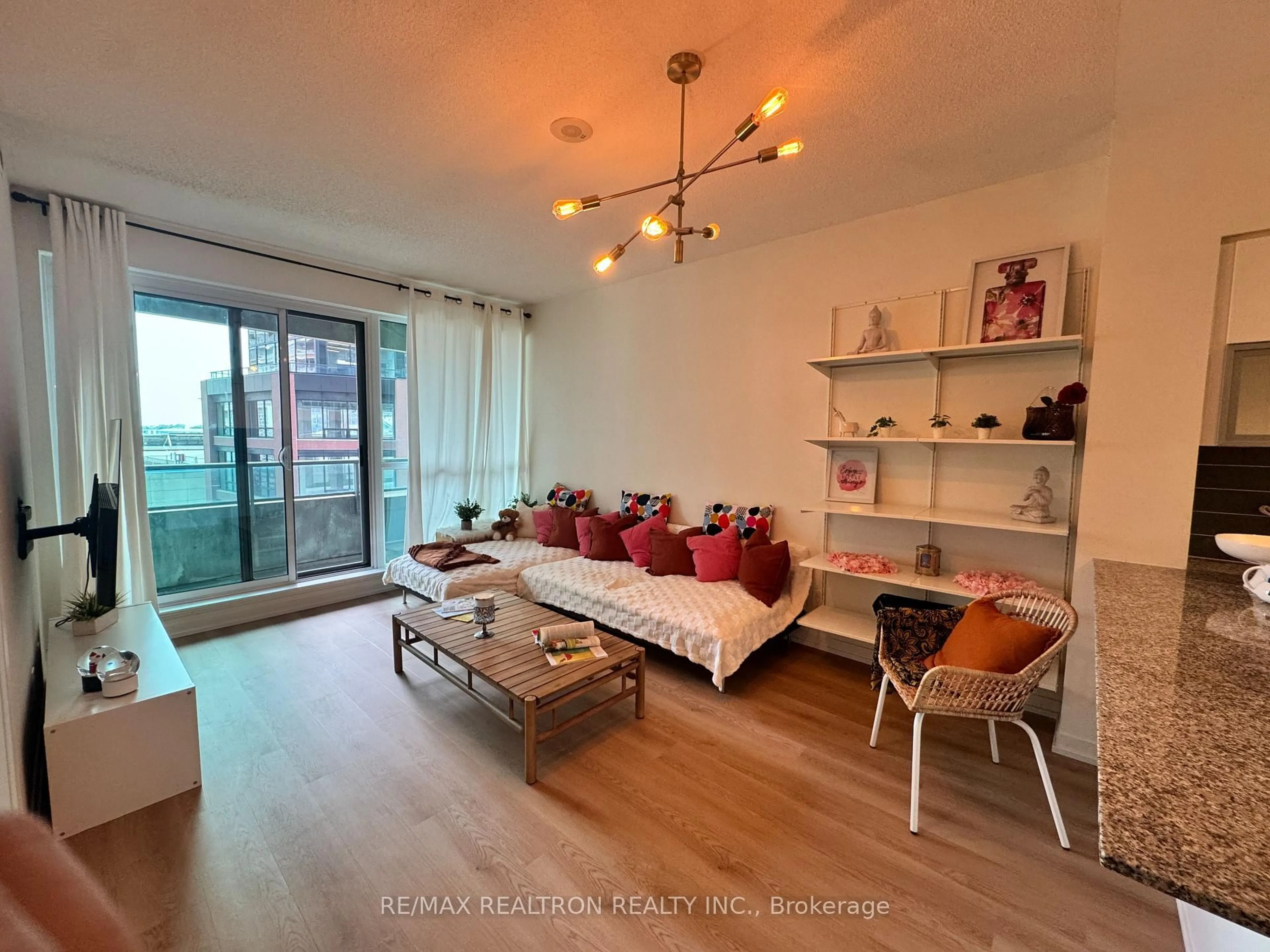 Living room with furniture, wood/laminate floor for 150 East Liberty St #407, Toronto Ontario M6K 3R5