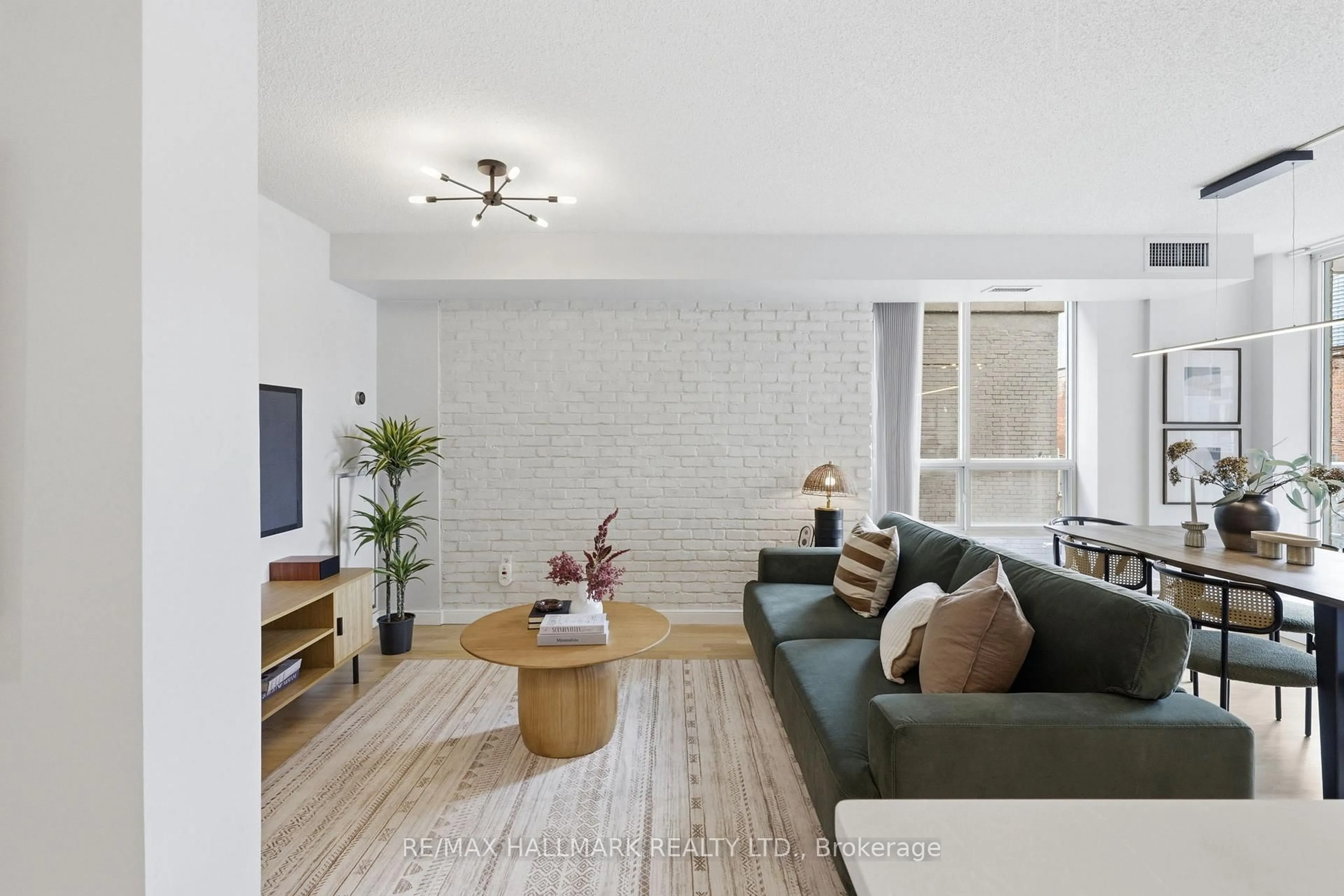 Living room with furniture, unknown for 311 Richmond St #303, Toronto Ontario M5A 4S7