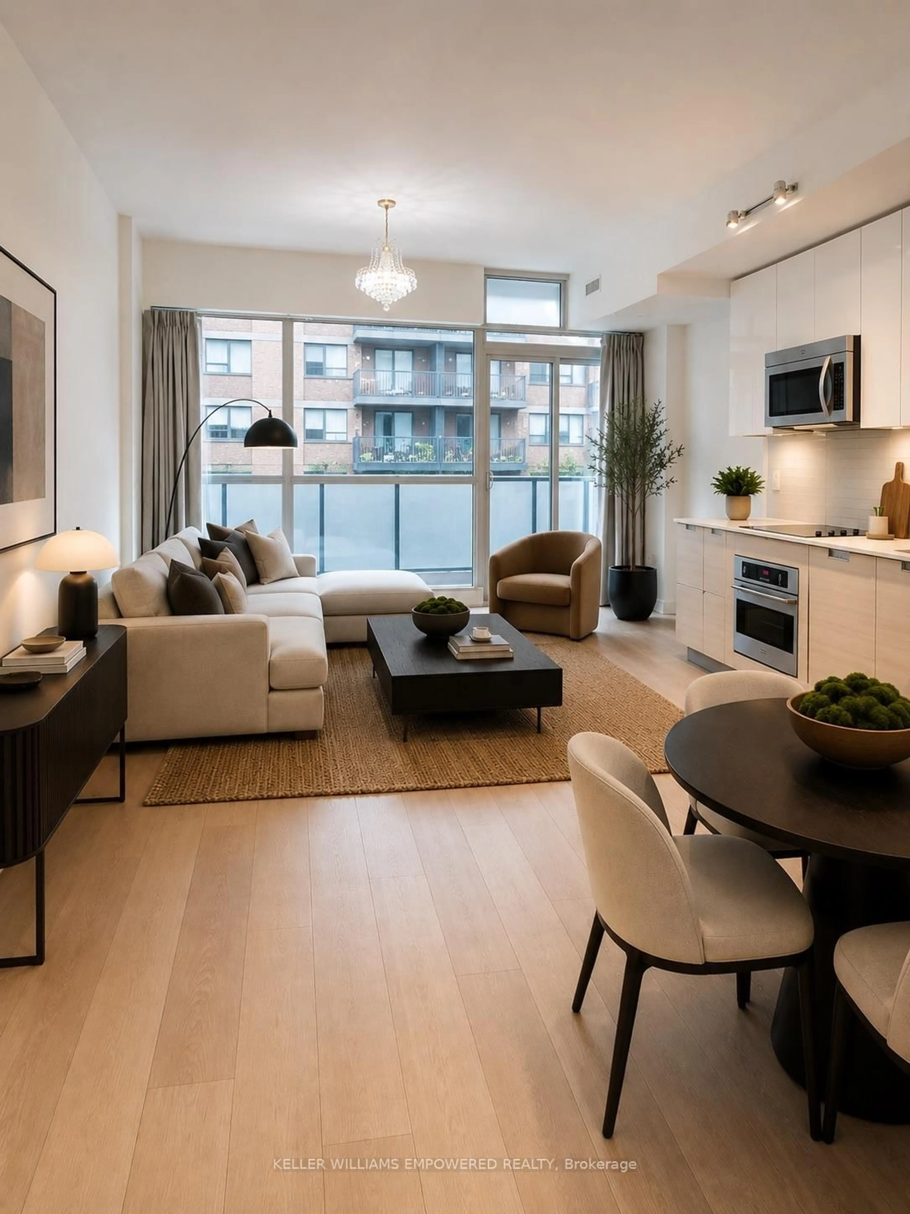 Living room with furniture, wood/laminate floor for 210 Simcoe St #406, Toronto Ontario M5T 0A9