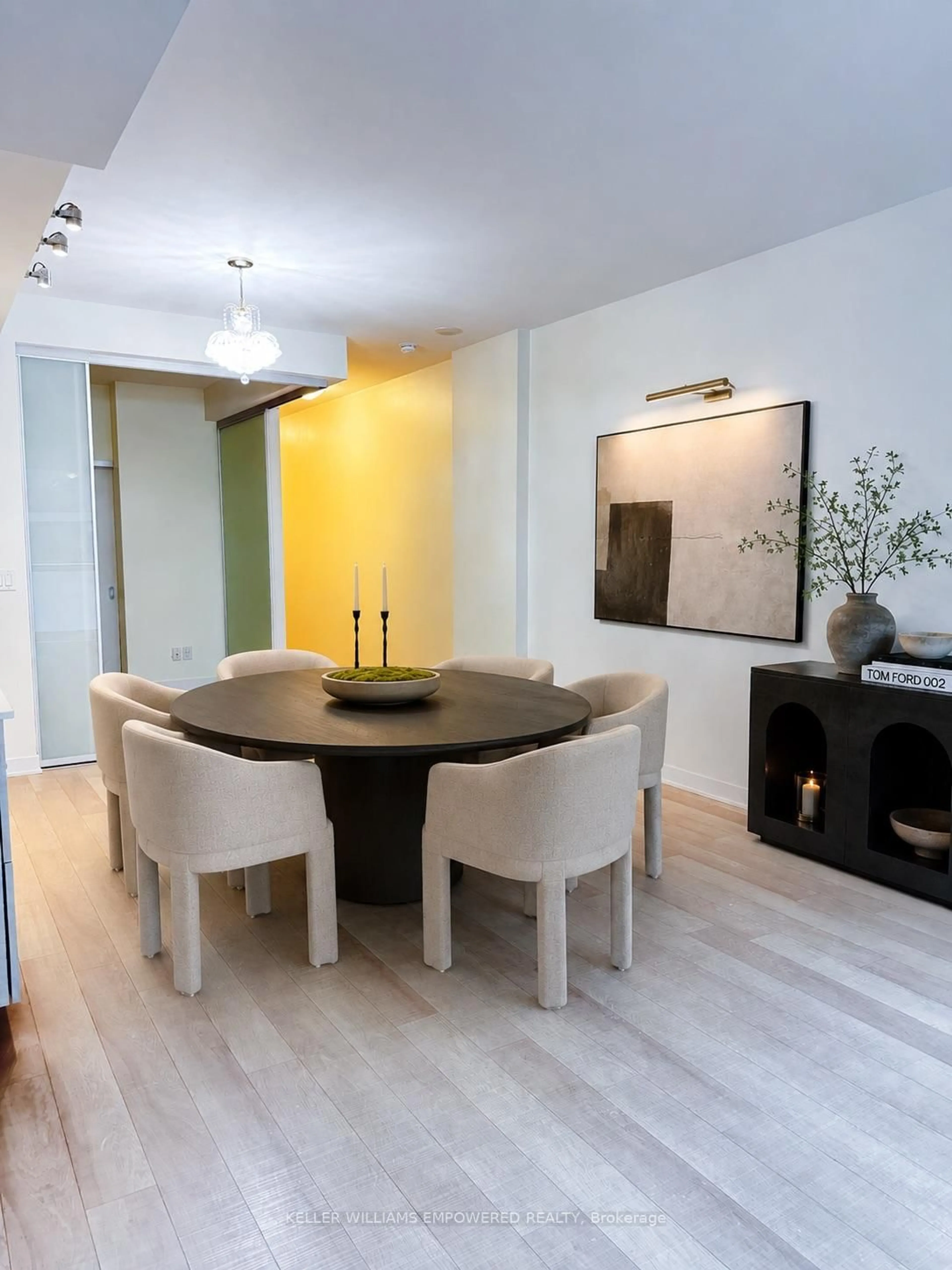 Dining room, wood/laminate floor for 210 Simcoe St #406, Toronto Ontario M5T 0A9