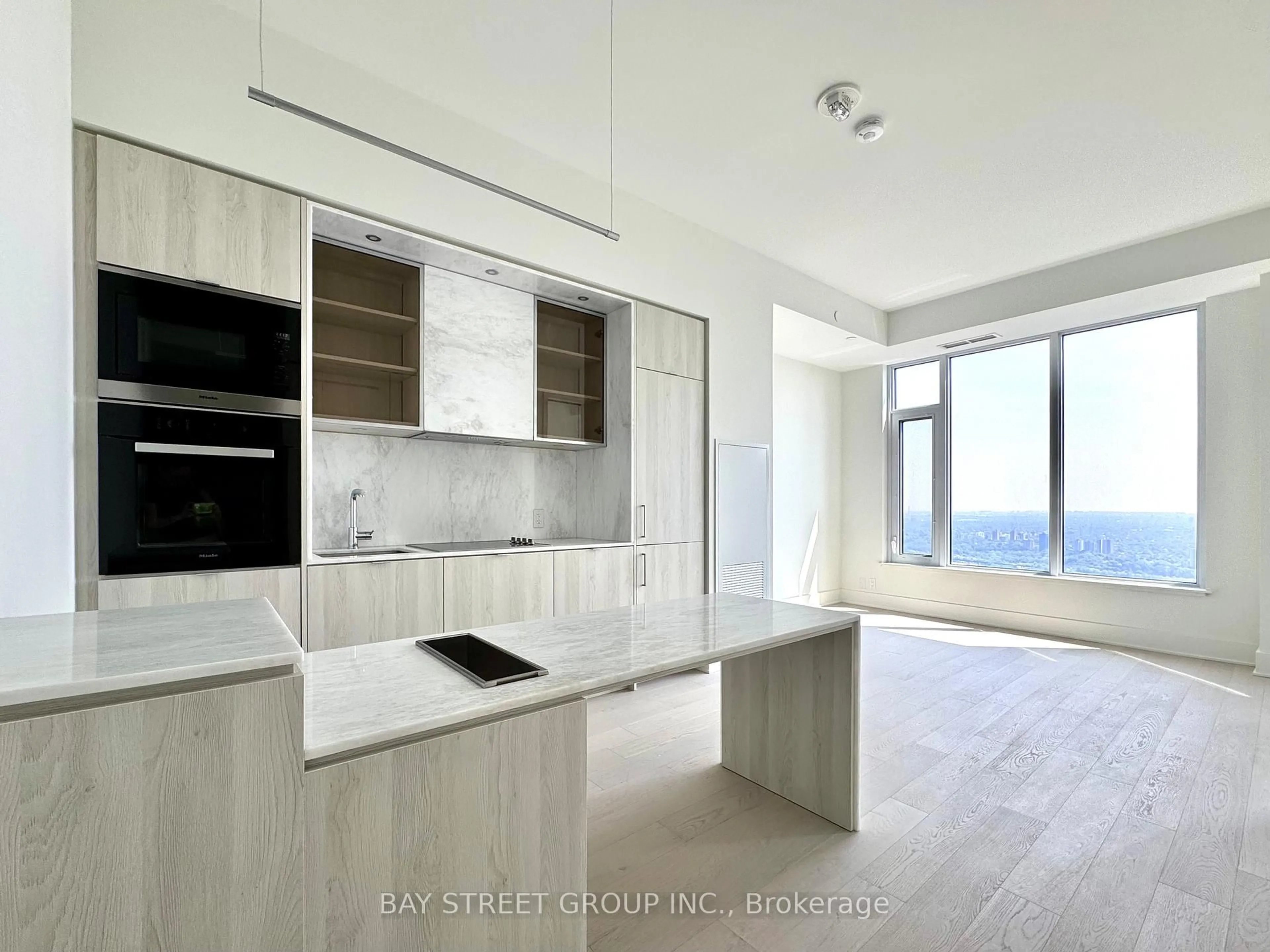 Open concept kitchen, unknown for 11 Yorkville Ave #6006, Toronto Ontario M4W 0B7