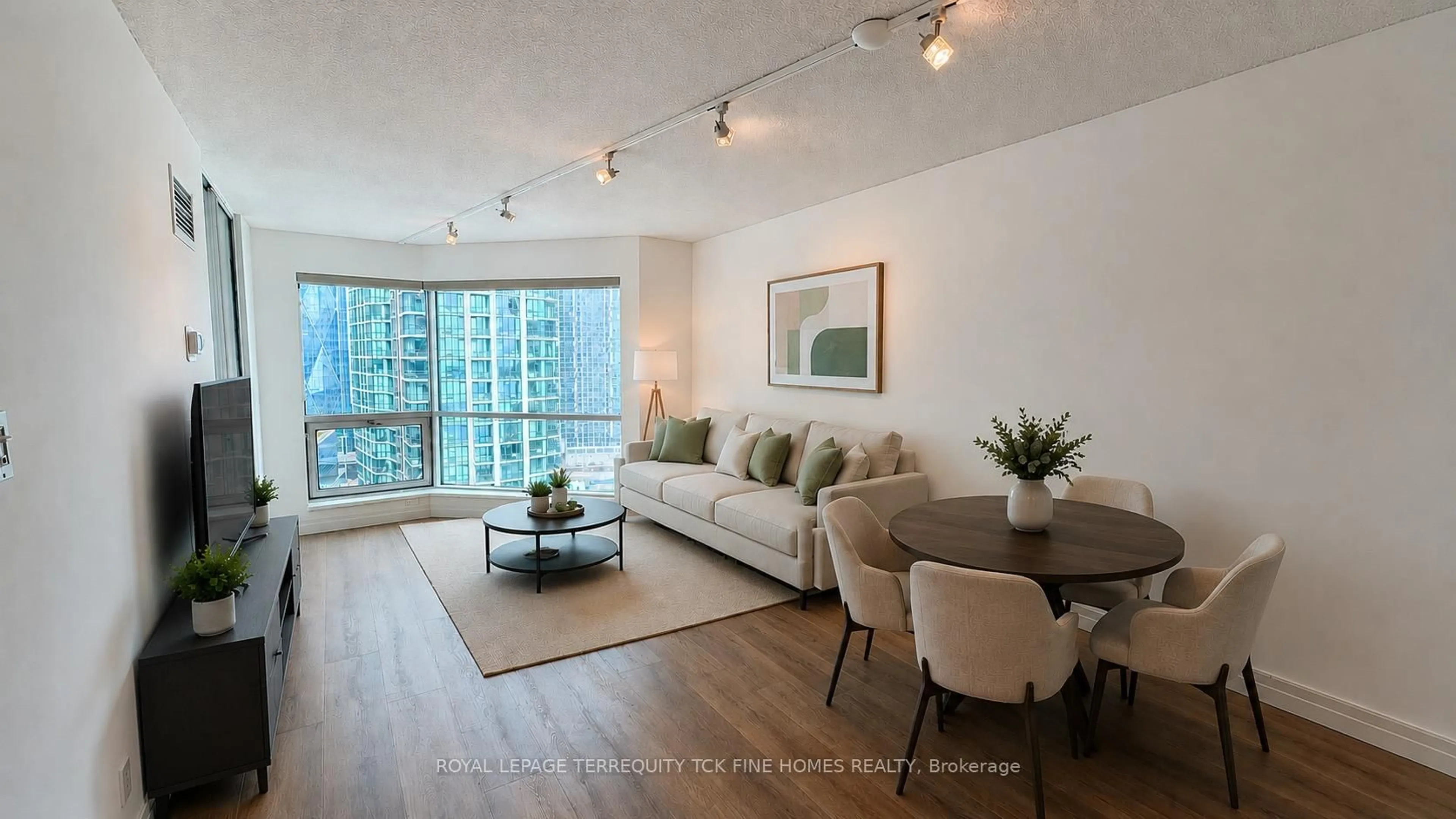 Living room with furniture, wood/laminate floor for 10 Yonge St #2604, Toronto Ontario M5E 1R4