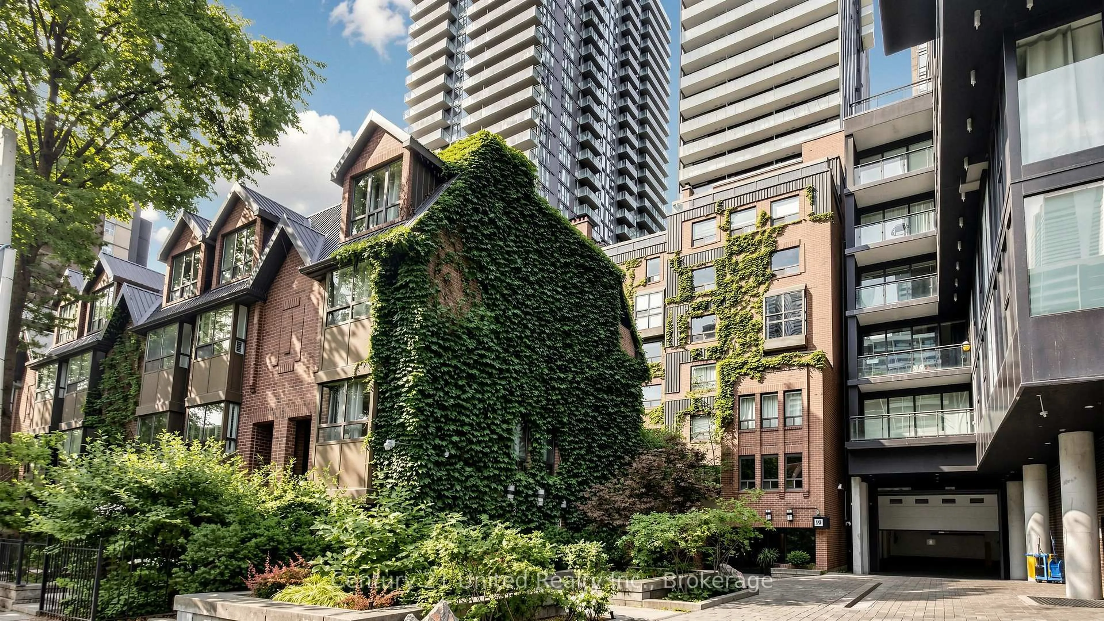 Patio, city buildings view from balcony for 19 Dundonald St #202, Toronto Ontario M4Y 1K3