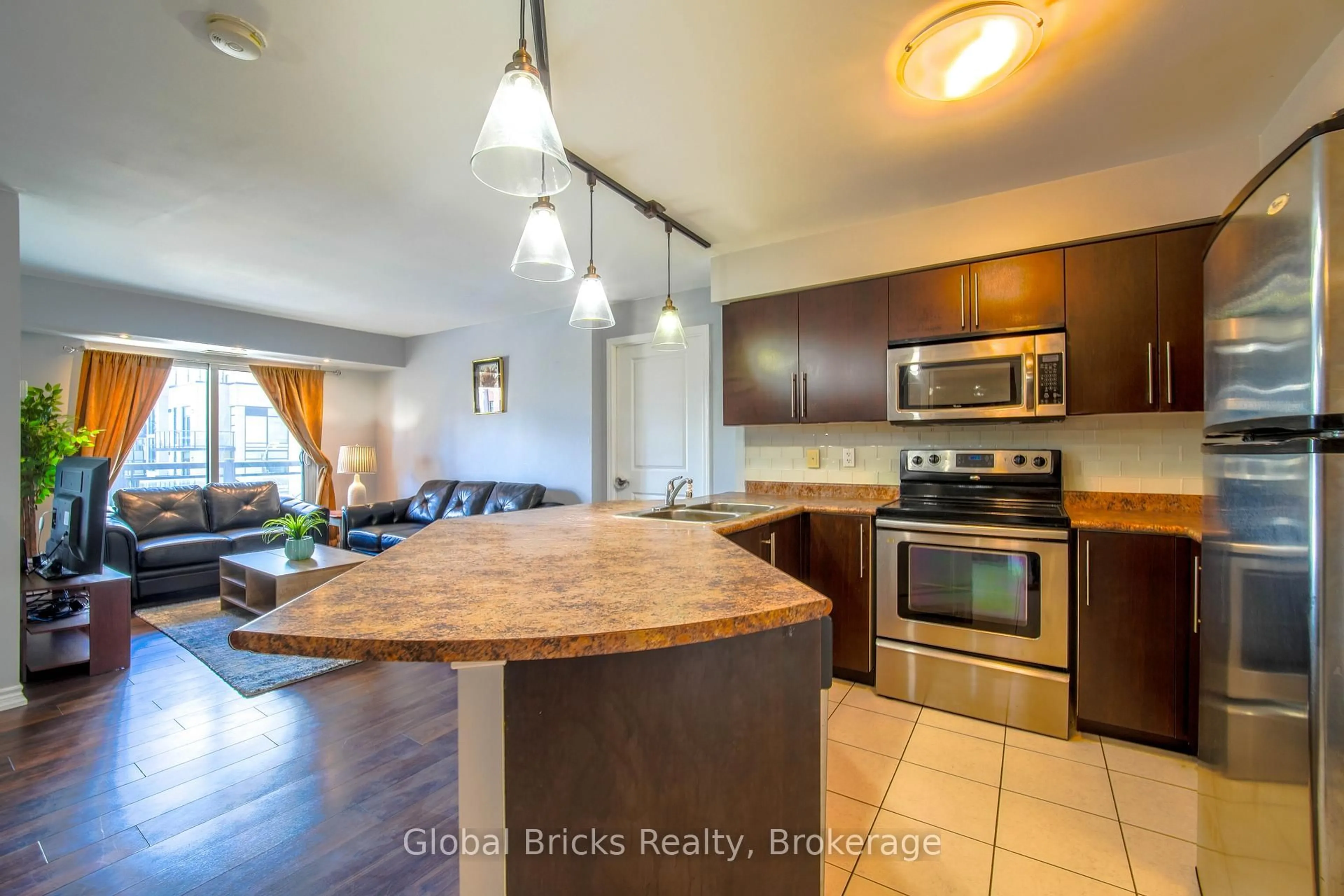 Open concept kitchen, unknown for 872 Sheppard Ave #308, Toronto Ontario M3H 2T5