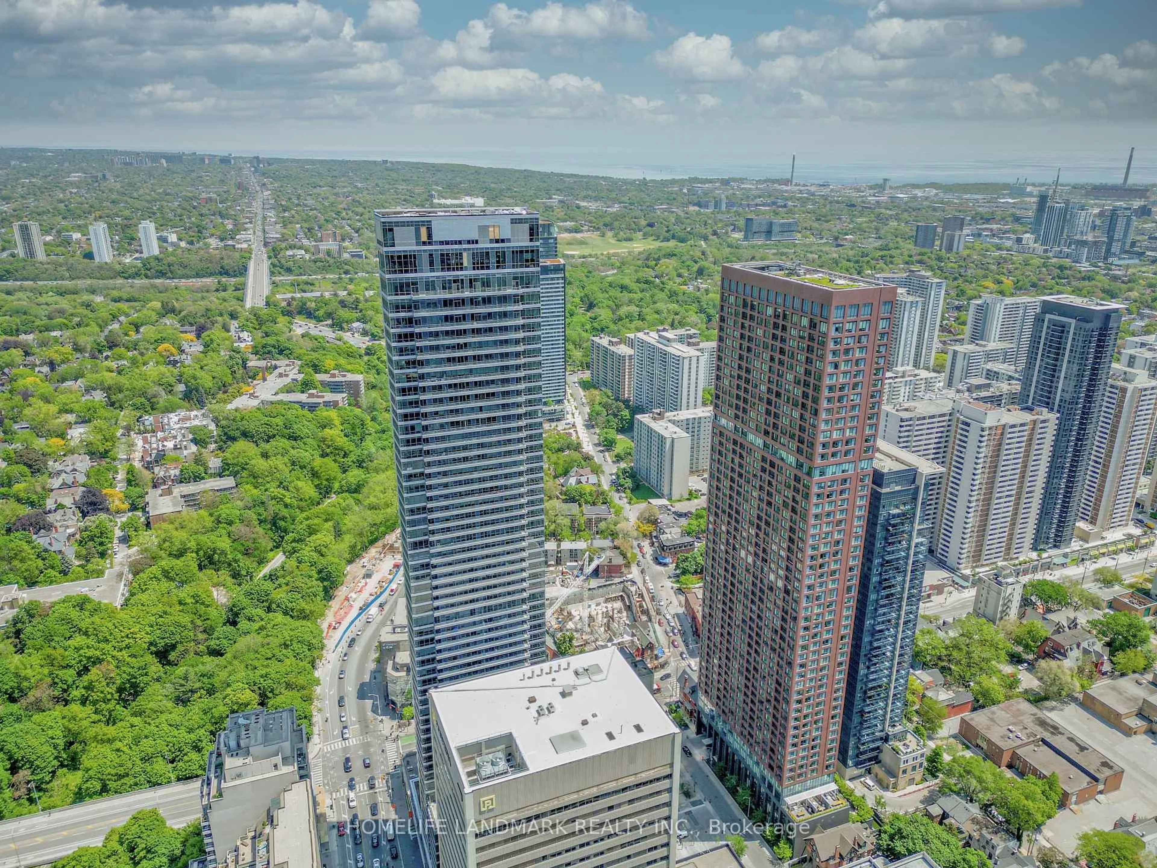 A pic from outside/outdoor area/front of a property/back of a property/a pic from drone, city buildings view from balcony for 395 Bloor St #5001, Toronto Ontario M4W 0B4
