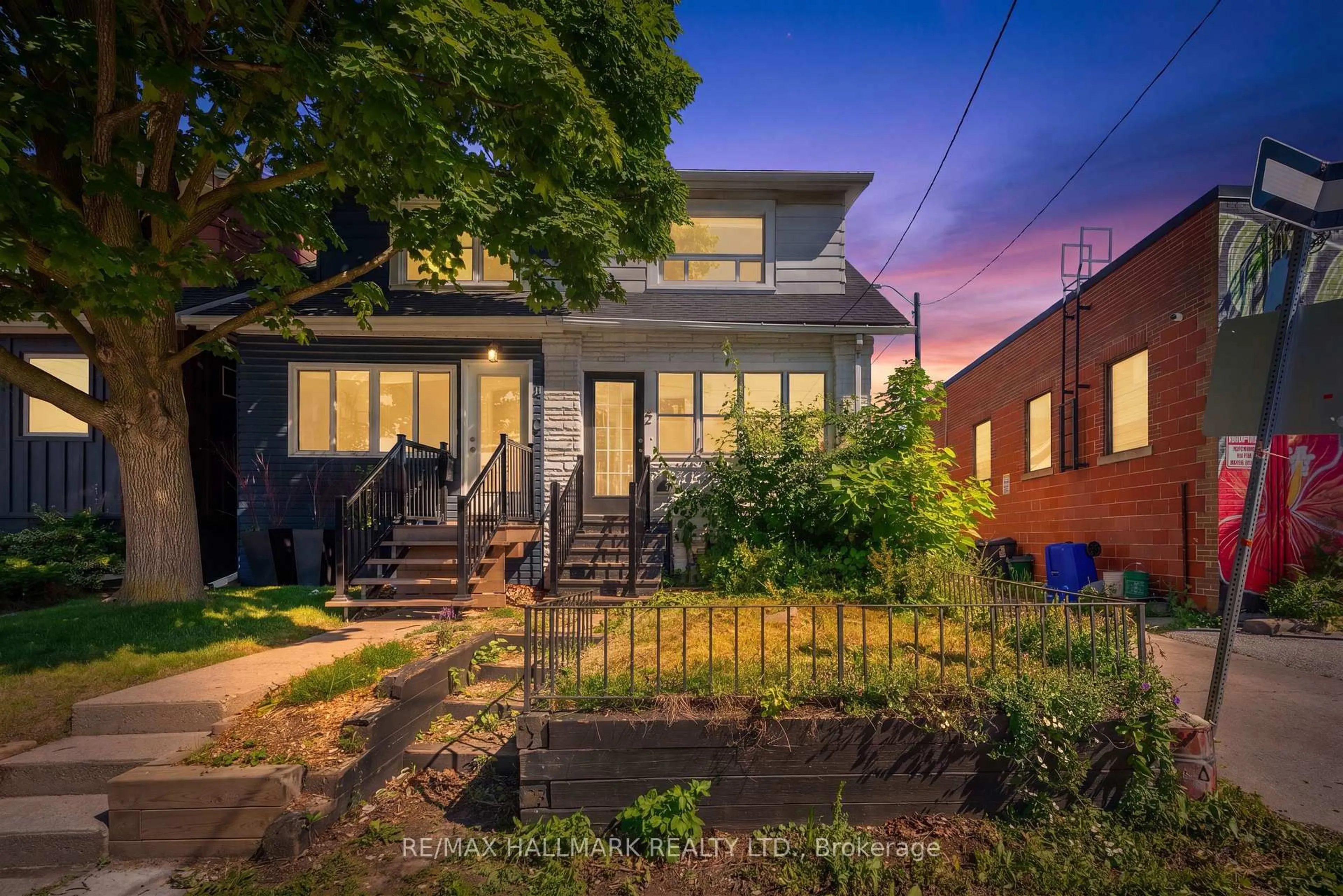 Home with brick exterior material, street for 2 Amherst Ave, Toronto Ontario M6E 1Z3