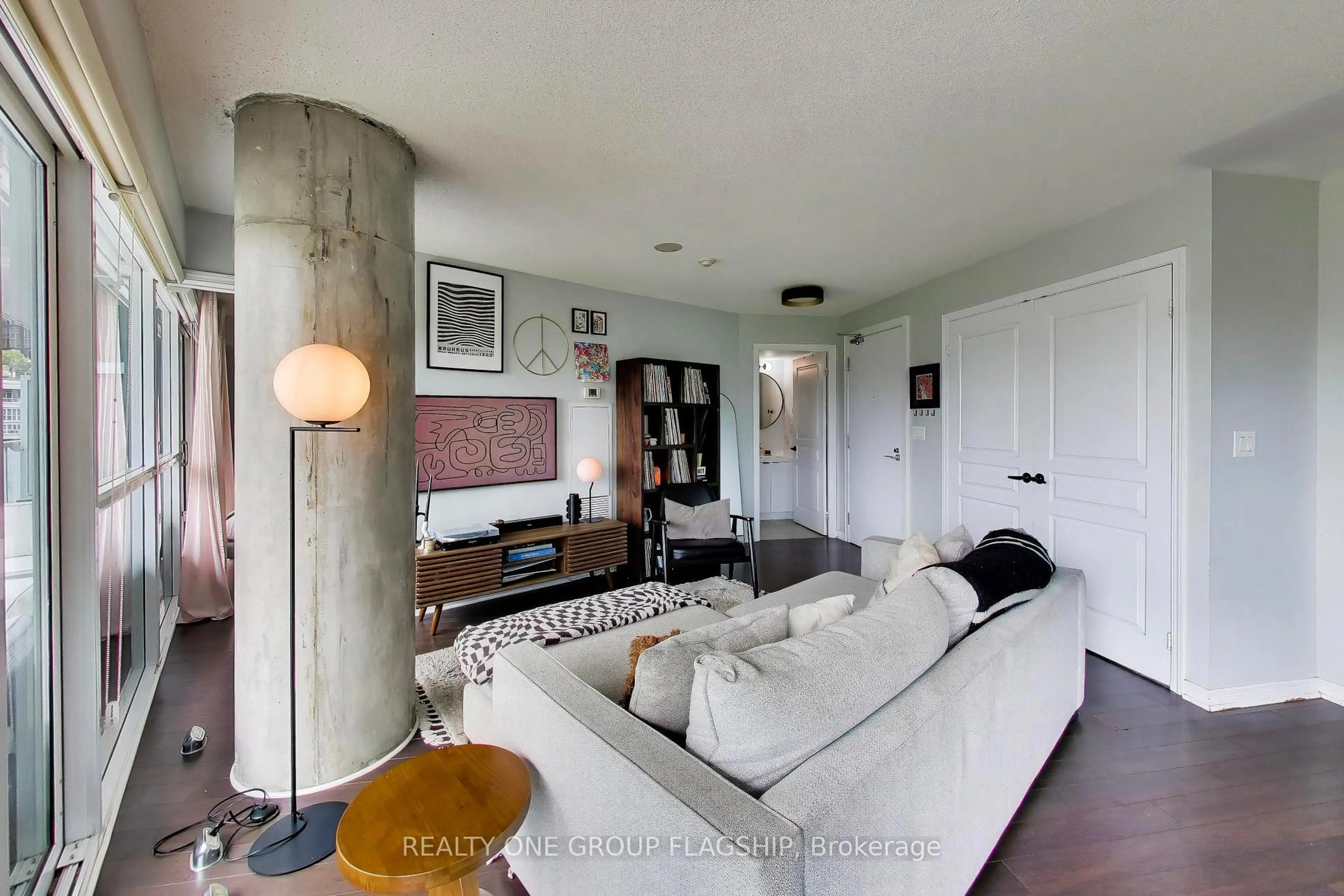 Living room with furniture, cement floor for 352 Front St #918, Toronto Ontario M5V 0K3