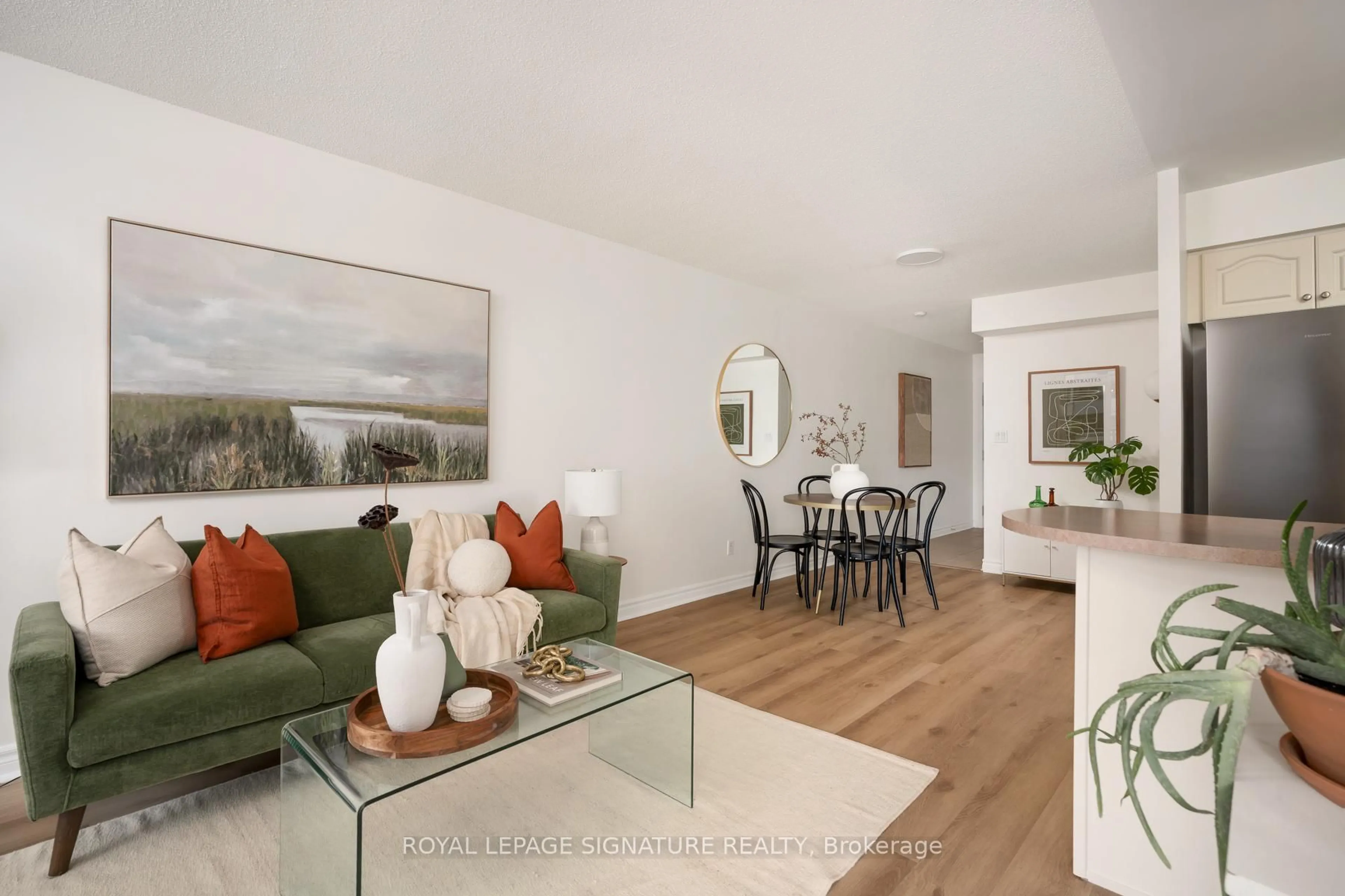 Living room with furniture, wood/laminate floor for 2 Rean Dr #306, Toronto Ontario M2K 3B8