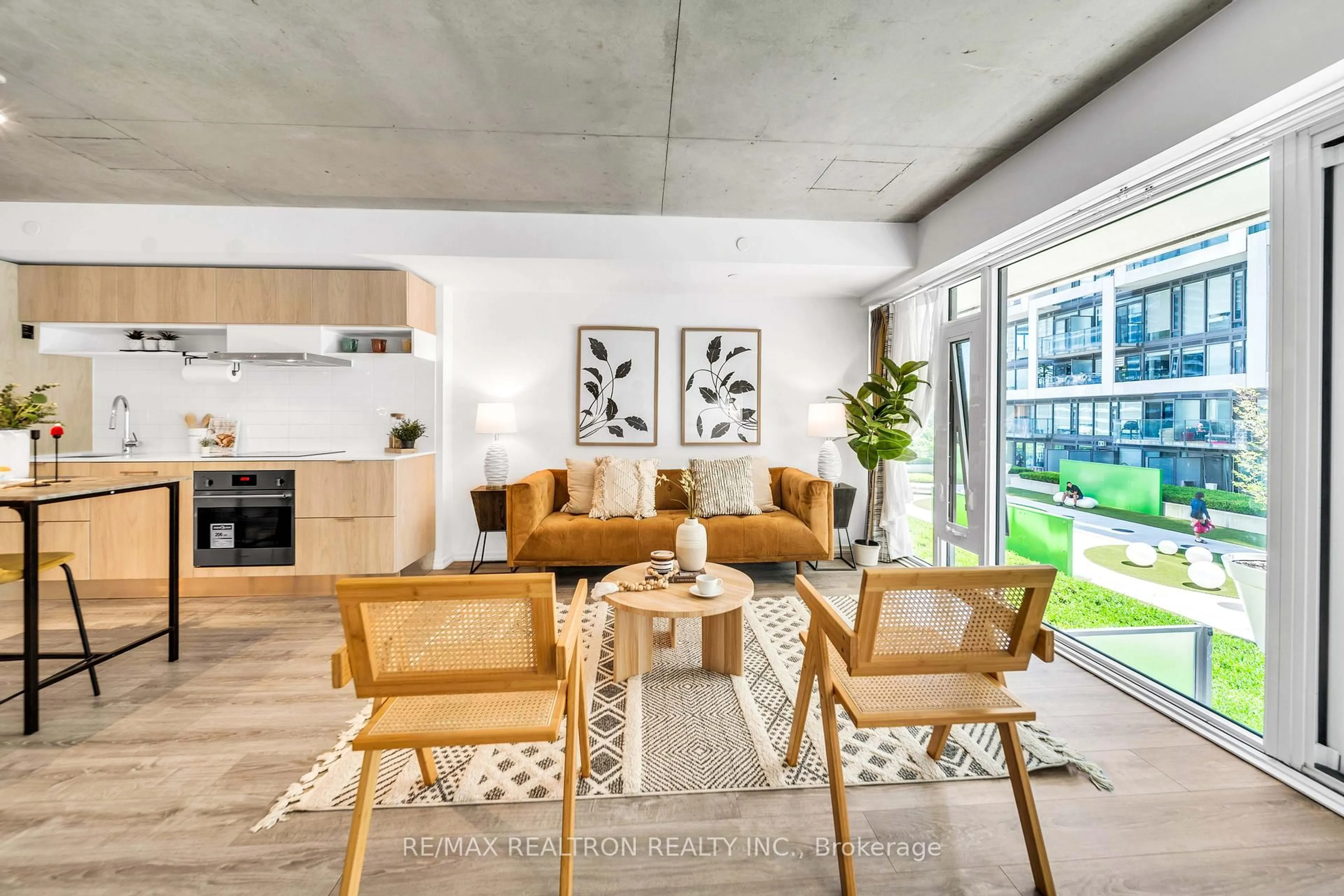Living room with furniture, cement floor for 5 SOUDAN Ave #746, Toronto Ontario M4S 0B1